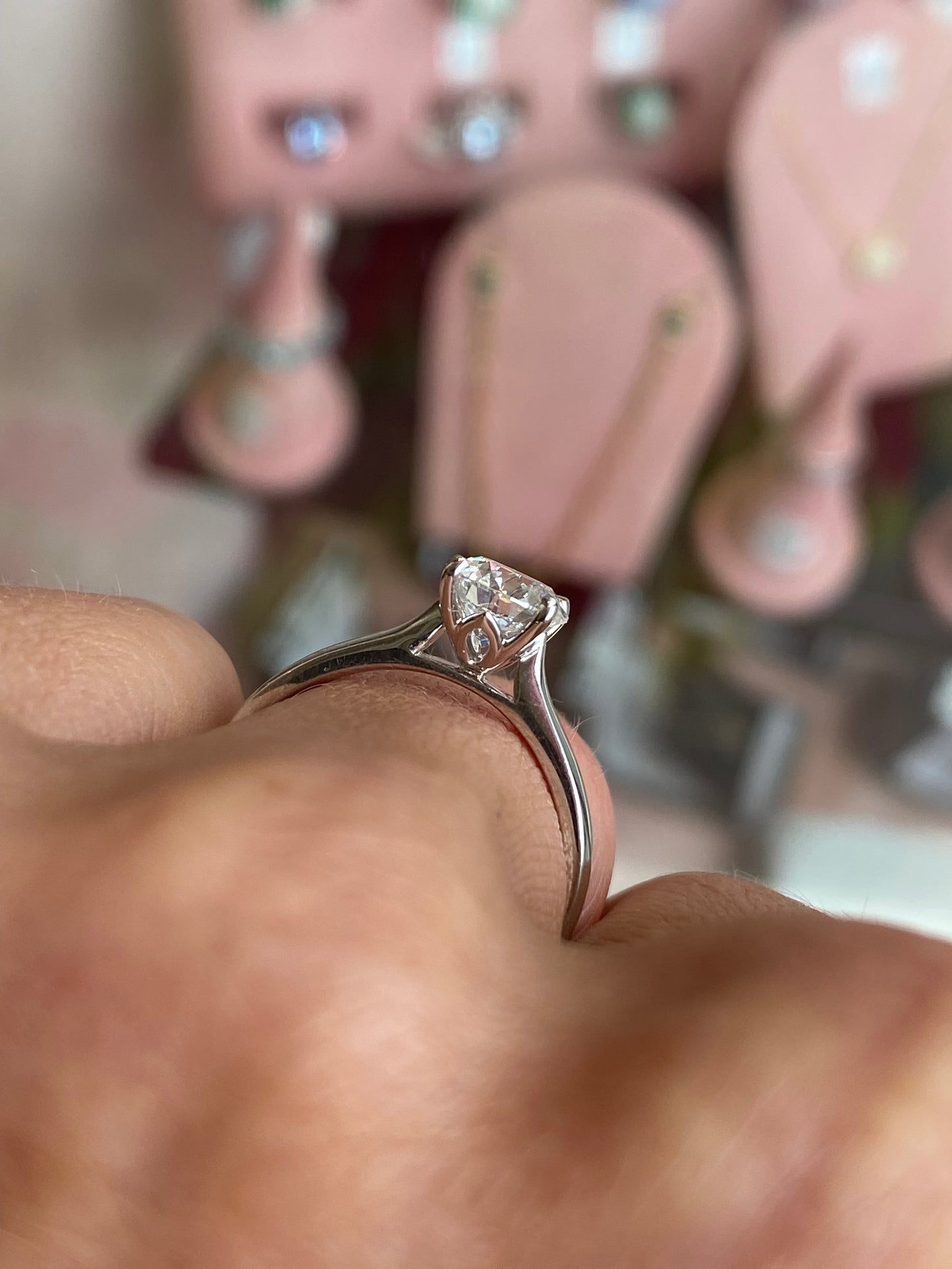 TCA platinum solitaire engagement ring with a 1.12ct certificated lab diamond, showcasing a classic design with a solitaire setting.