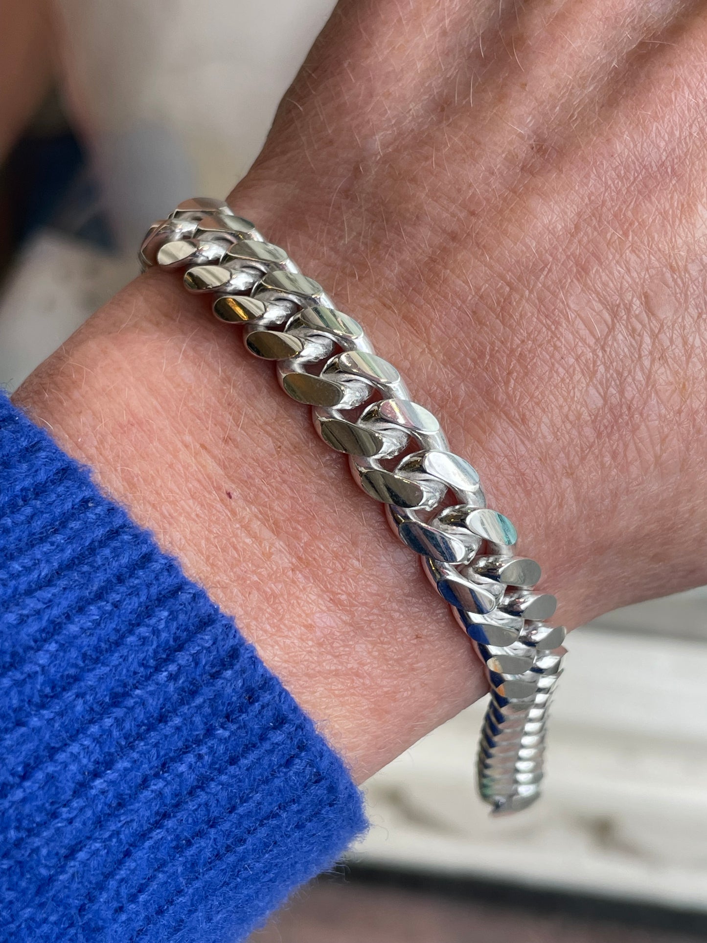 Silver chunky solid curb bracelet by Insignia, 21cm length, featuring bold interlinked links on a plain background.