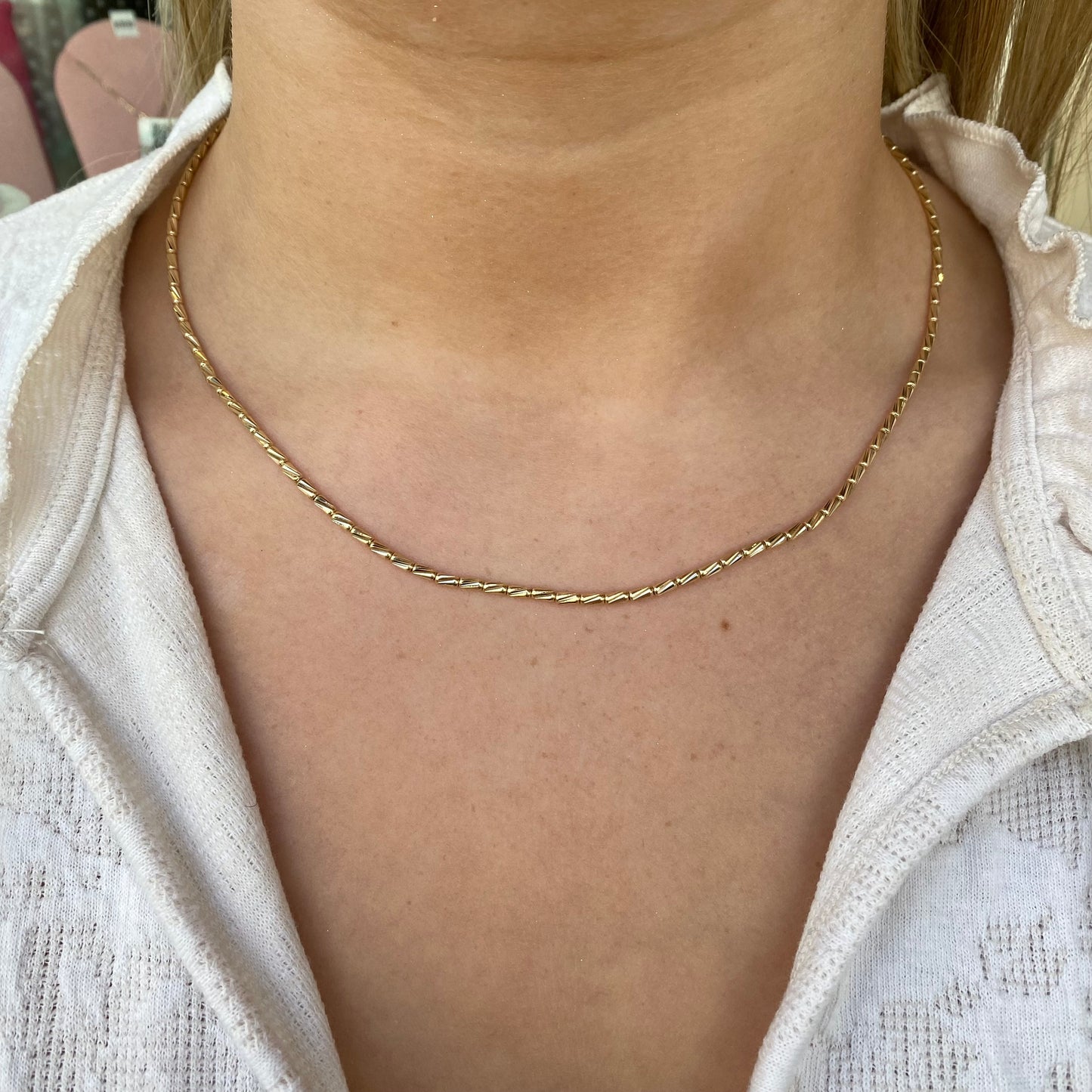 PJD 9ct gold diamond cut necklace with 46cm chain, showcasing intricate polished links on a white background.