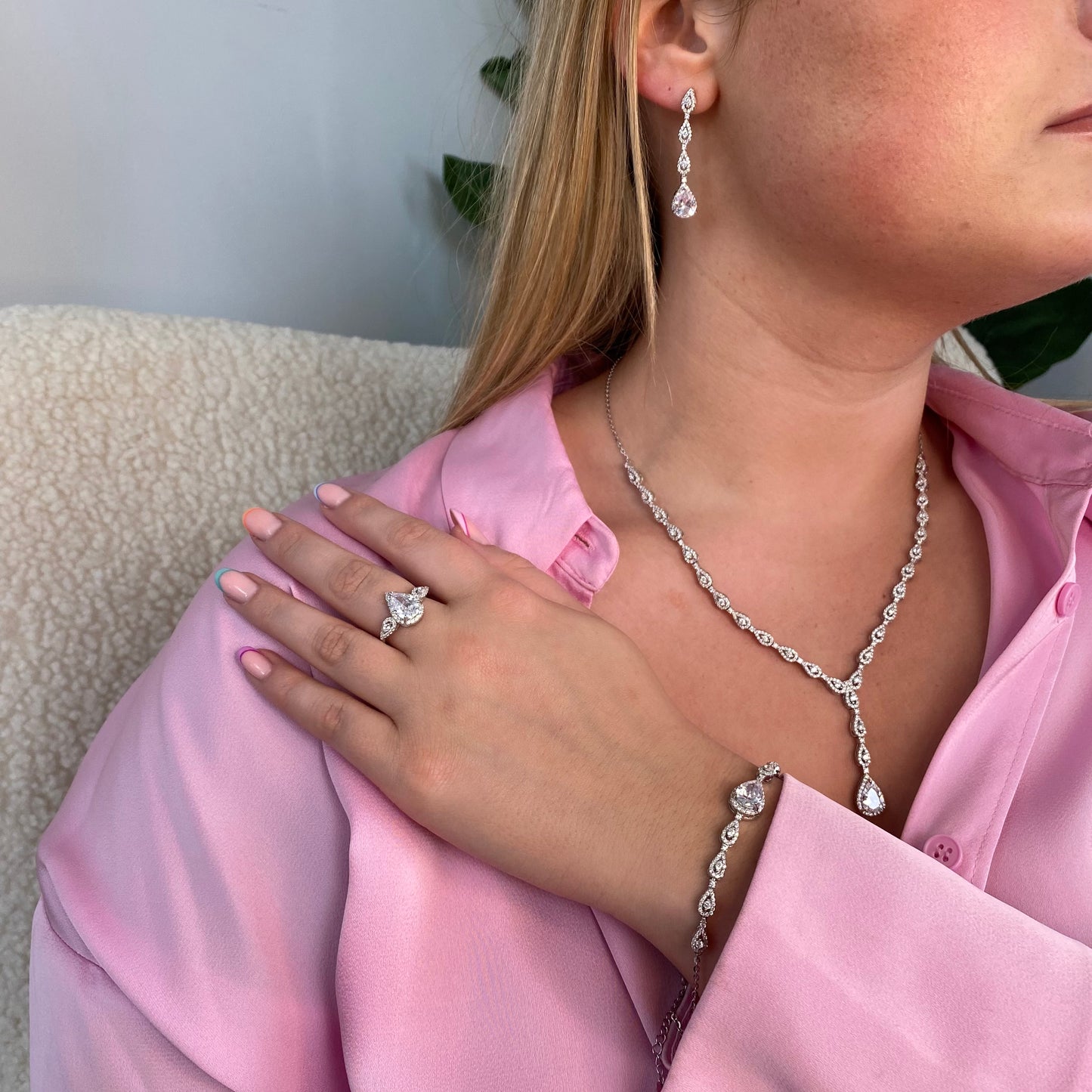 Silver Emilie drop earrings by Comero featuring elegant, dangling earring design with a polished silver finish.