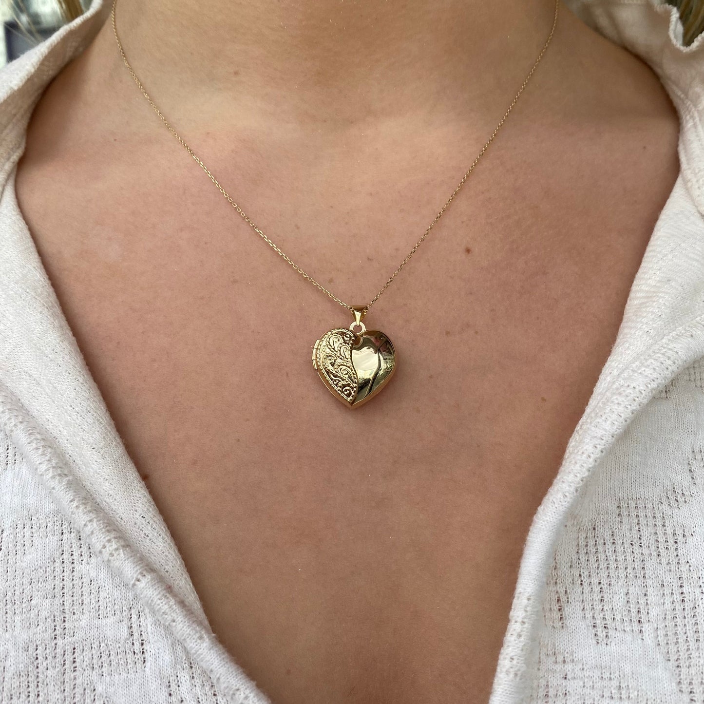 9ct gold engraved heart locket necklace by PJD, featuring a detailed heart pendant with intricate engravings.