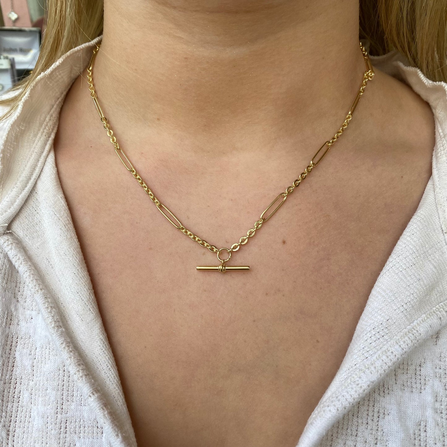 9ct gold paperlink Figaro T-bar necklace with 46cm chain, featuring intricate link design and elegant T-bar clasp from PJD.