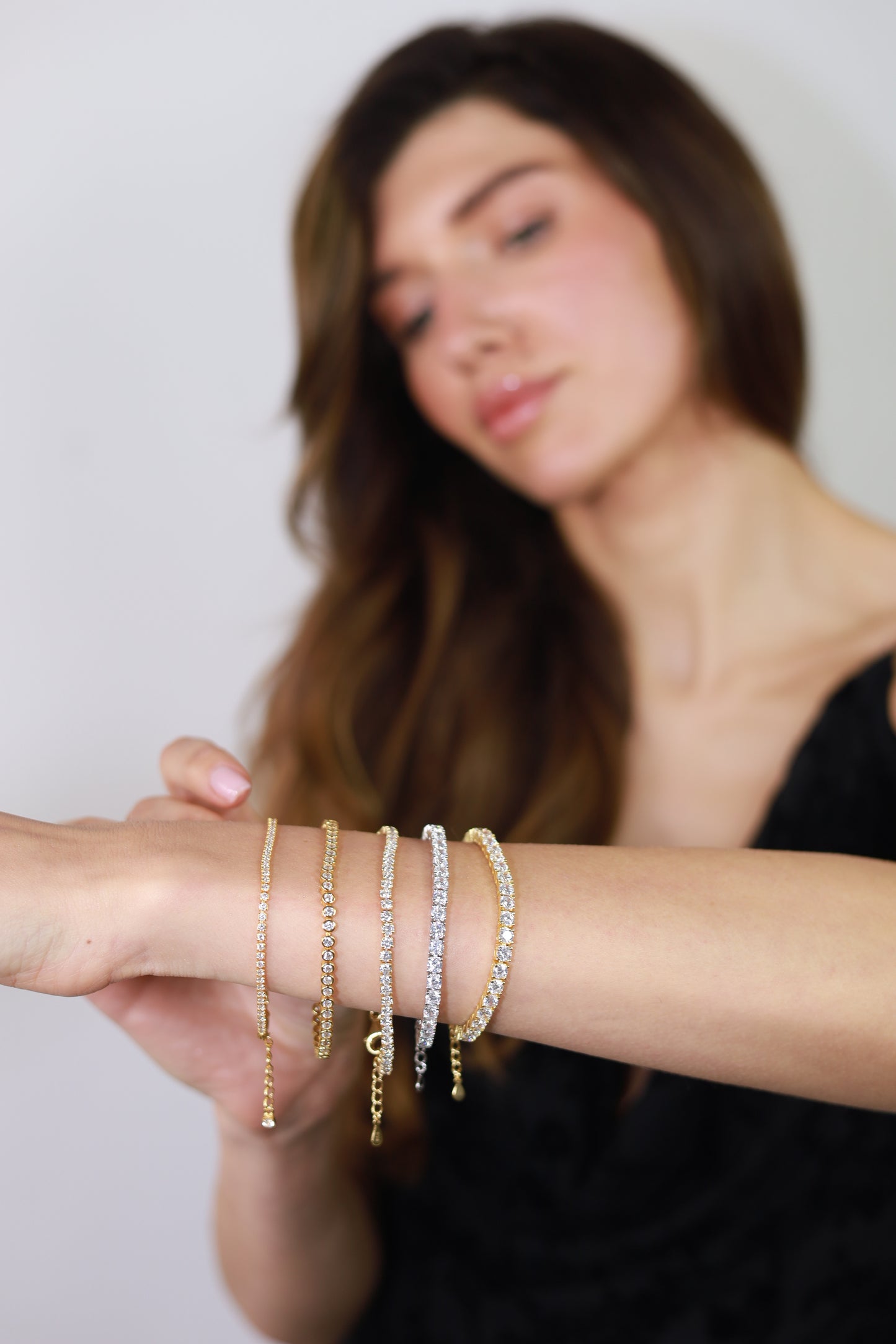 Sunshine CZ tennis bracelet by Comero featuring 4mm sparkling cubic zirconia stones on a delicate bracelet chain.