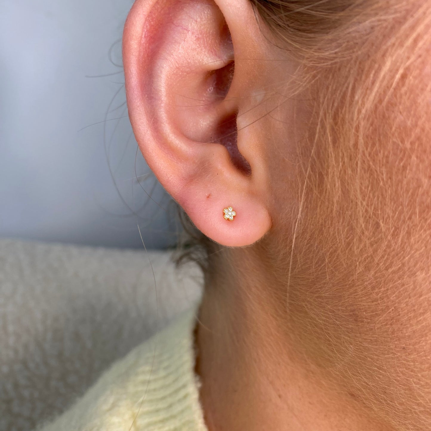 Kid's Sunshine CZ Flower Stud Earrings by Comero featuring sparkling flower-shaped CZ stones on silver studs