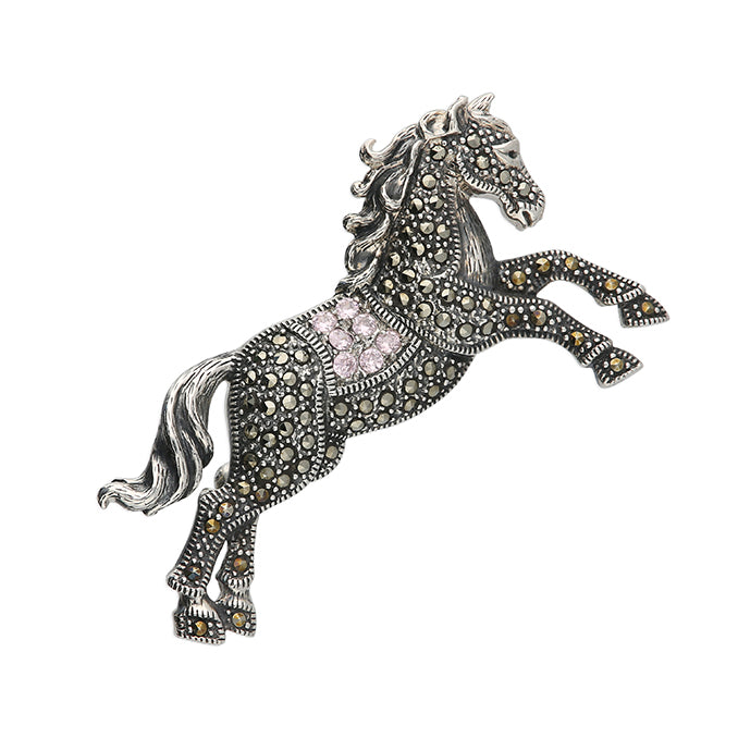 Silver marcasite and pink CZ rearing horse brooch by CME, showcasing intricate detailing and elegant design.