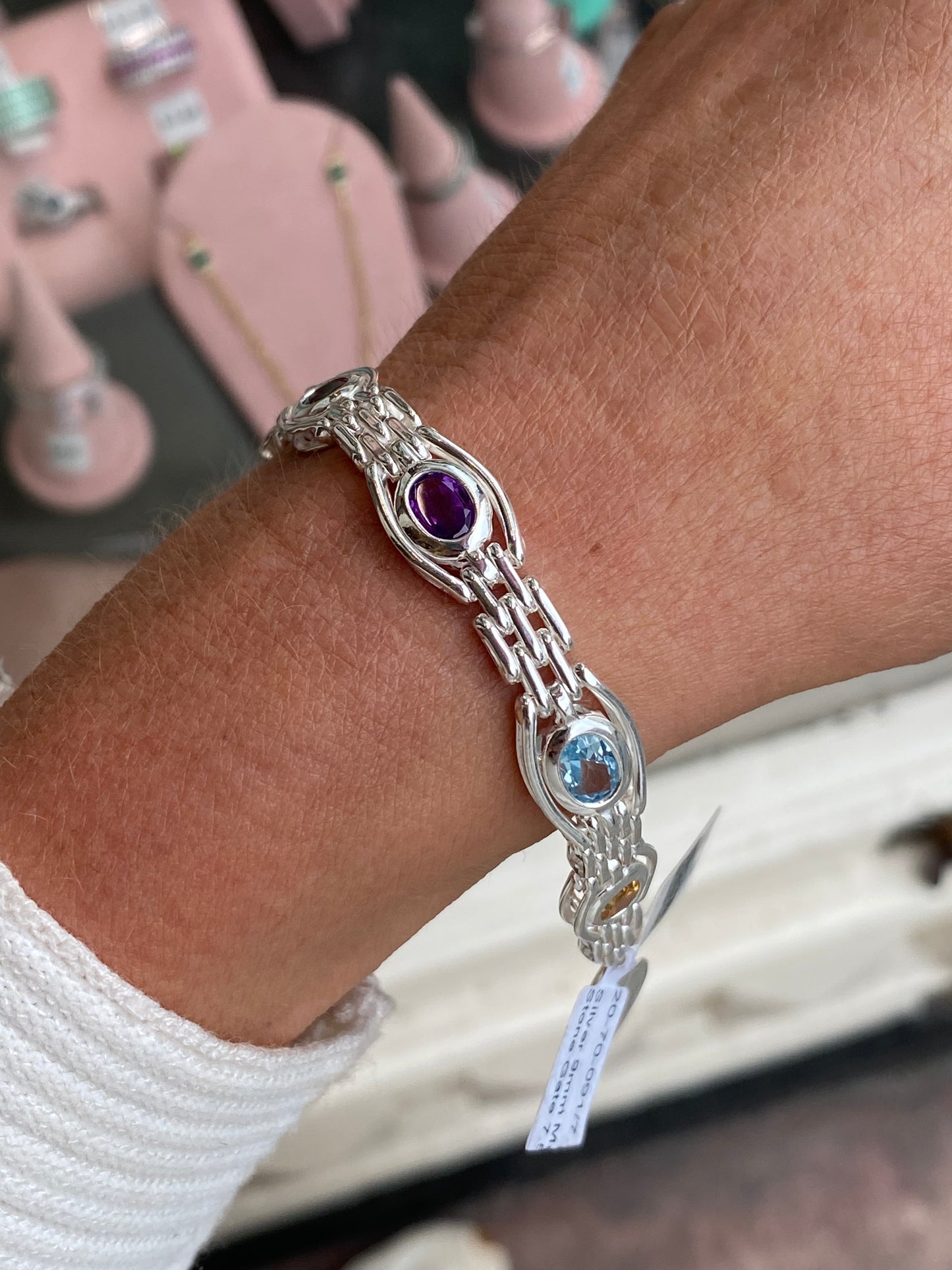 Herbert silver mixed gemstone gate bracelet with colorful stones on a 7.5-inch chain, showcasing intricate design and vibrant gemstone details.