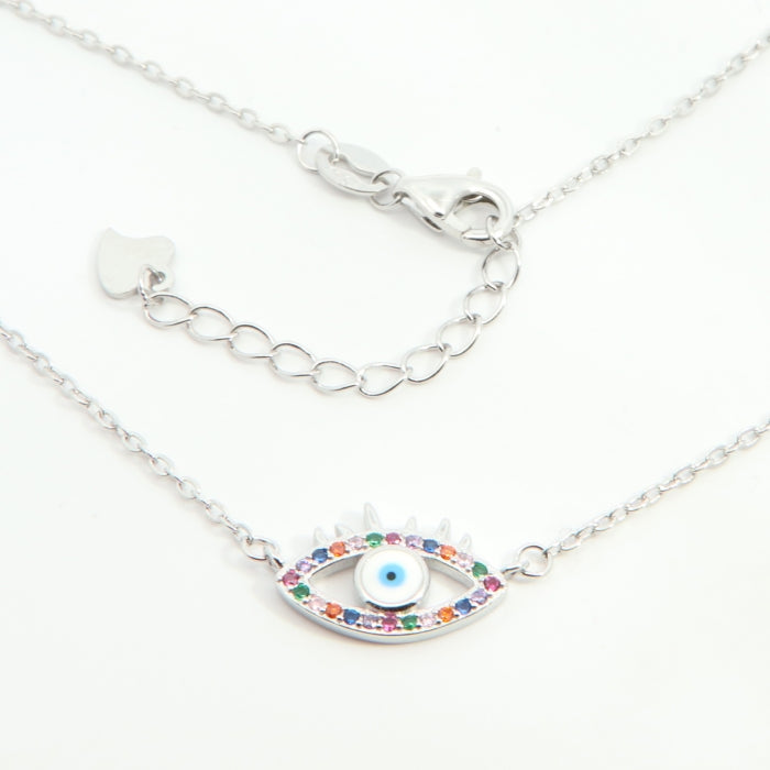 Silver Colours Evil Eye Necklace by Comero featuring a detailed evil eye pendant on a silver chain.
