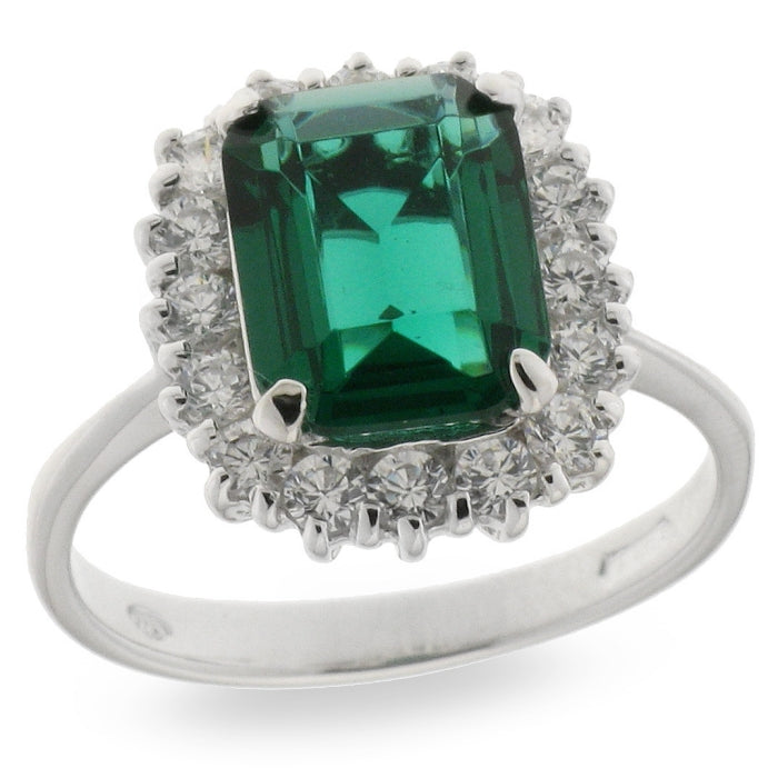 Silver emerald green CZ statement ring by Comero featuring a bold design with sparkling green stones.