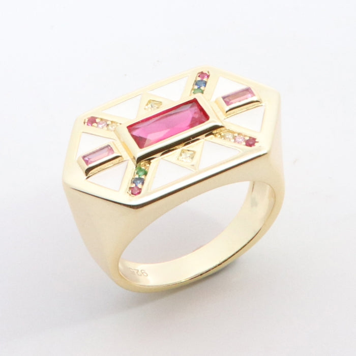 Colorful geometric statement ring by Comero with vibrant patterns, designed to add a bold touch to any outfit.