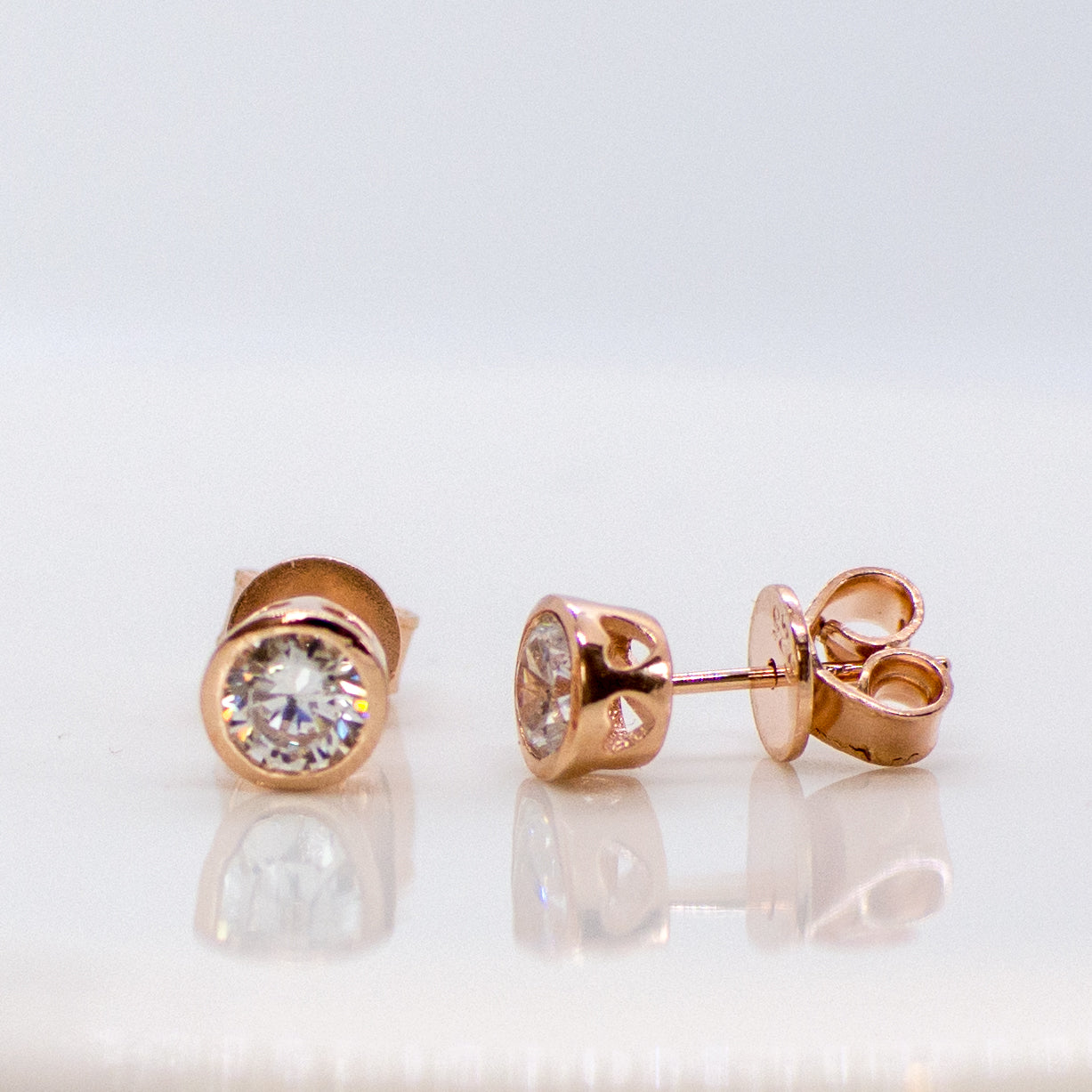 Rose Silver 5mm CZ Stud Earrings with a Heart Bezel - John Ross Jewellers
