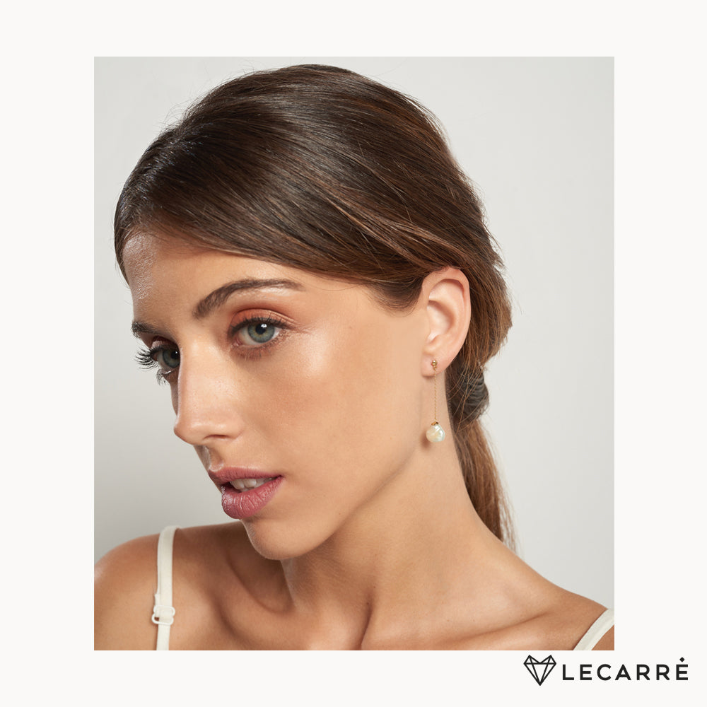 Lecarré 18ct gold baroque pearl drop earrings with elegant chain design, showcasing luxurious jewelry craftsmanship.