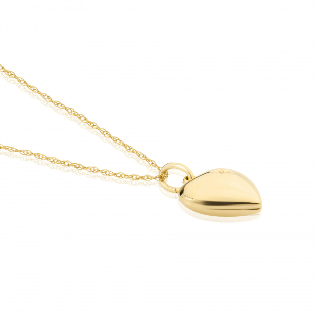 Mark Milton 9ct gold diamond heart locket necklace, close-up view of the elegant jewelry piece with sparkling diamonds and intricate design.