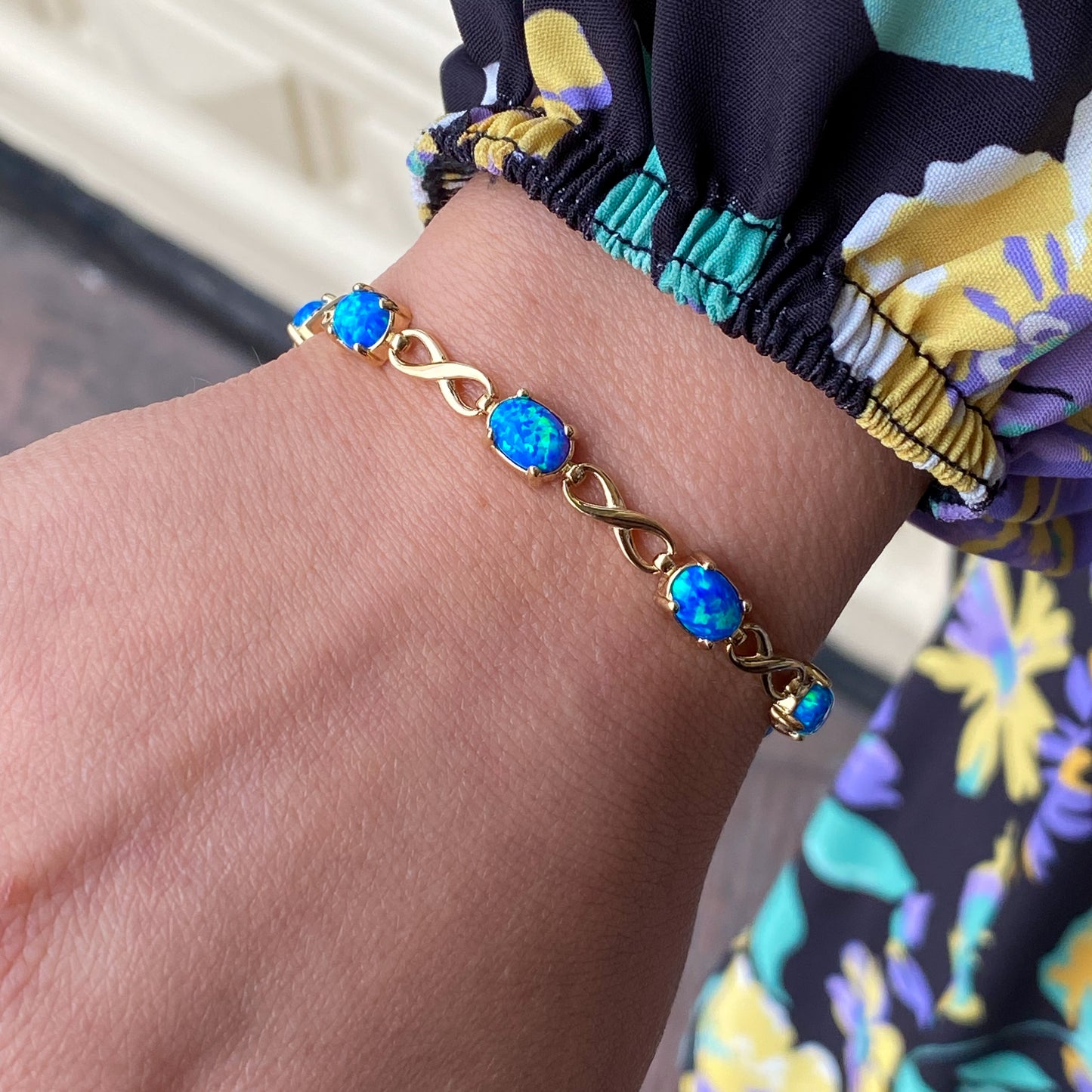 9ct Gold Blue Opalique Infinity Bracelet - John Ross Jewellers