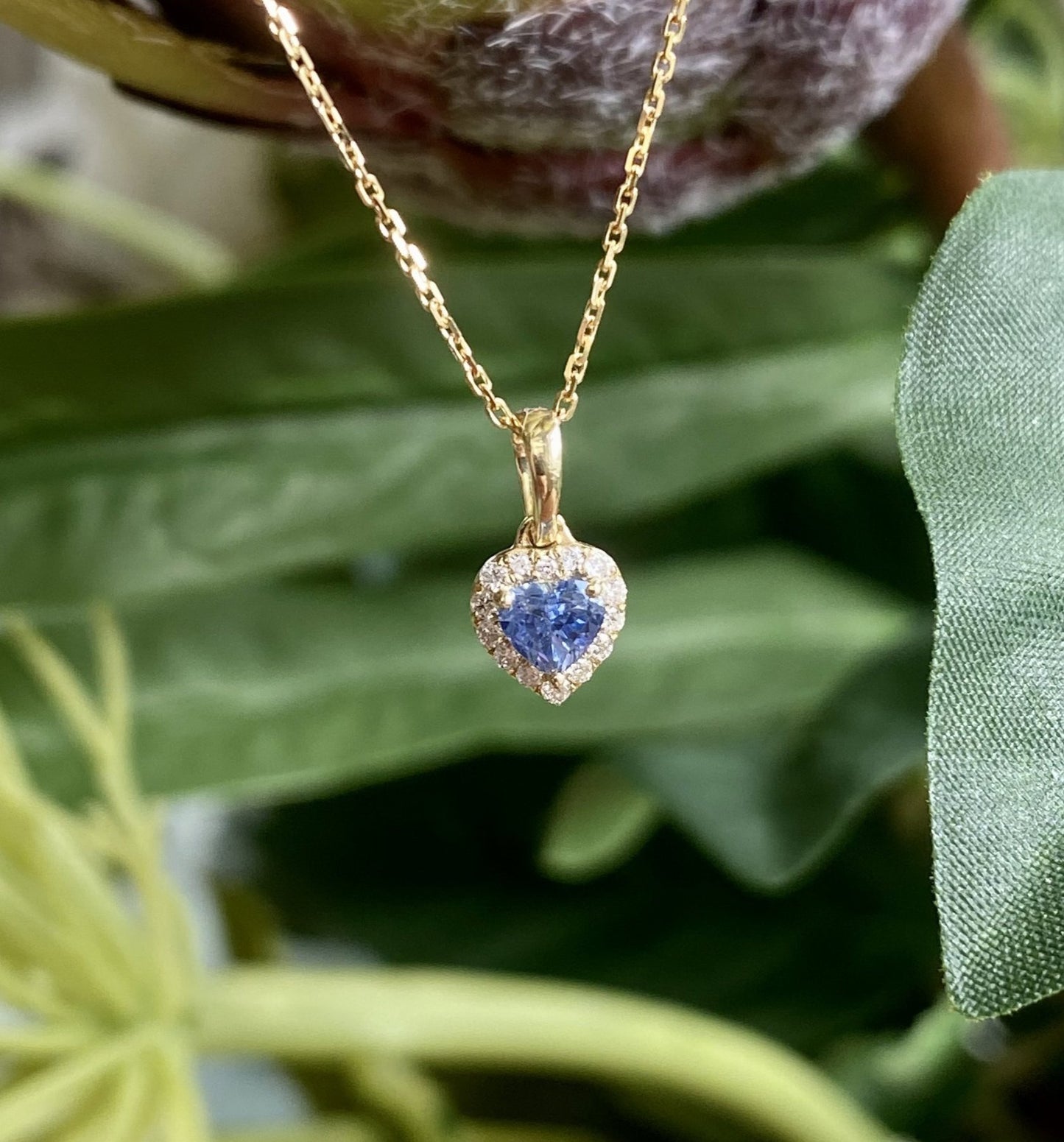 9ct gold sweet heart pendant necklace with sapphire and diamond accents, featuring a 0.28ct gemstone detail by LMJ.