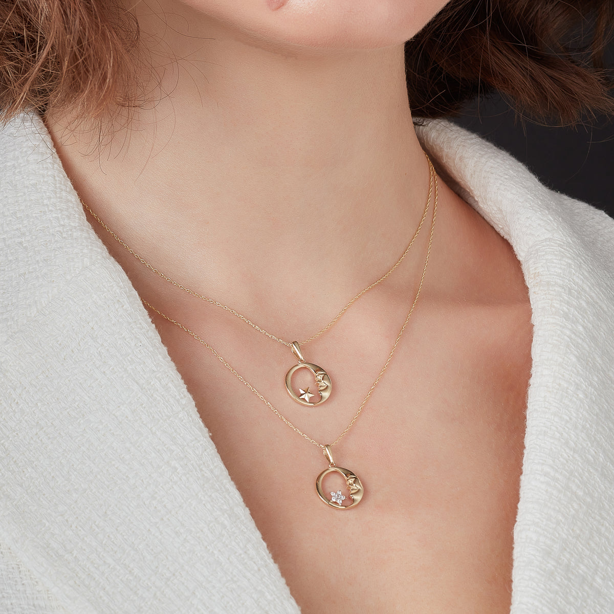 9ct gold crescent moon and CZ star necklace featuring a delicate chain and celestial pendant, designed by NJO.