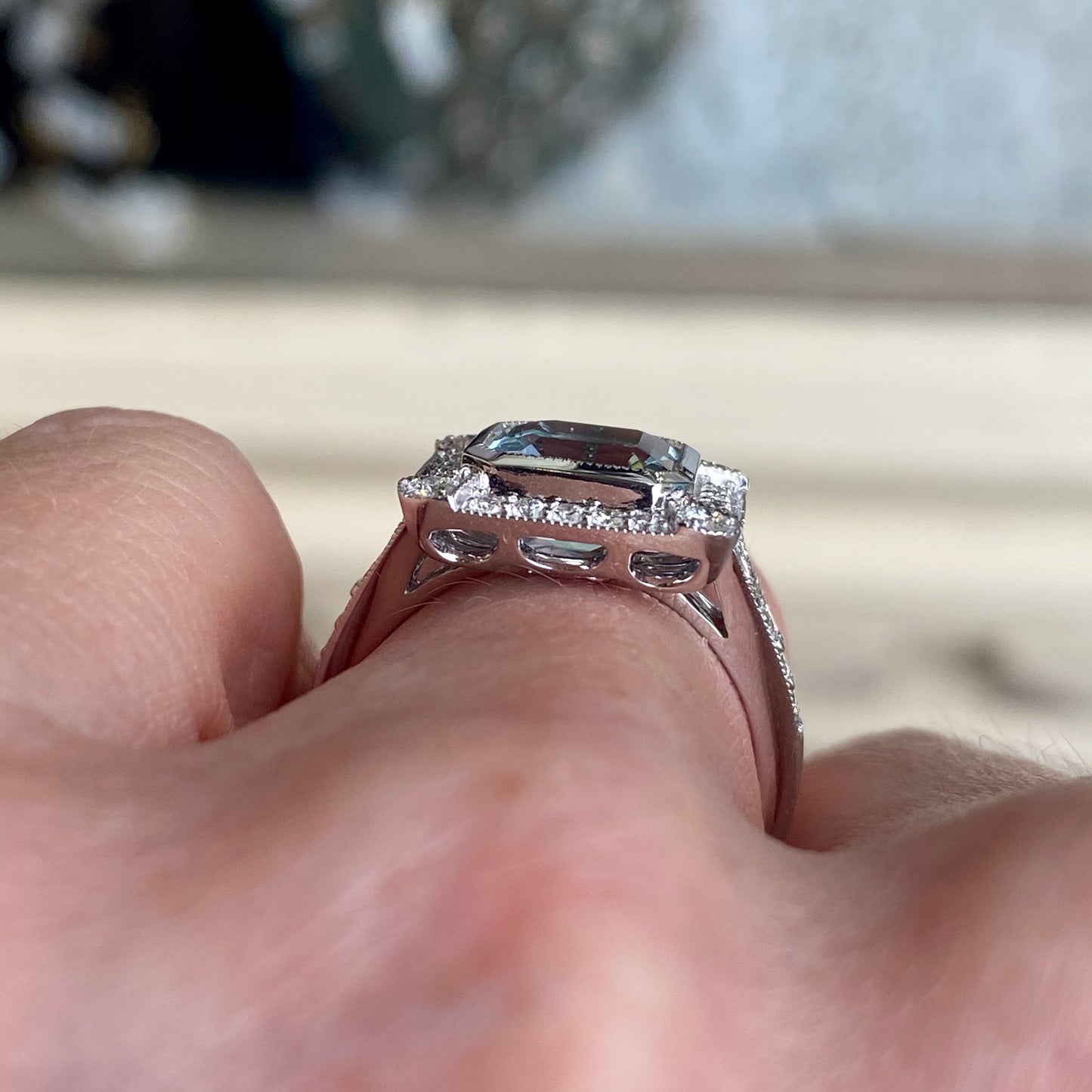 18ct white gold aquamarine and diamond ring by Mark Milton, showcasing a vibrant aquamarine gemstone with sparkling diamonds.