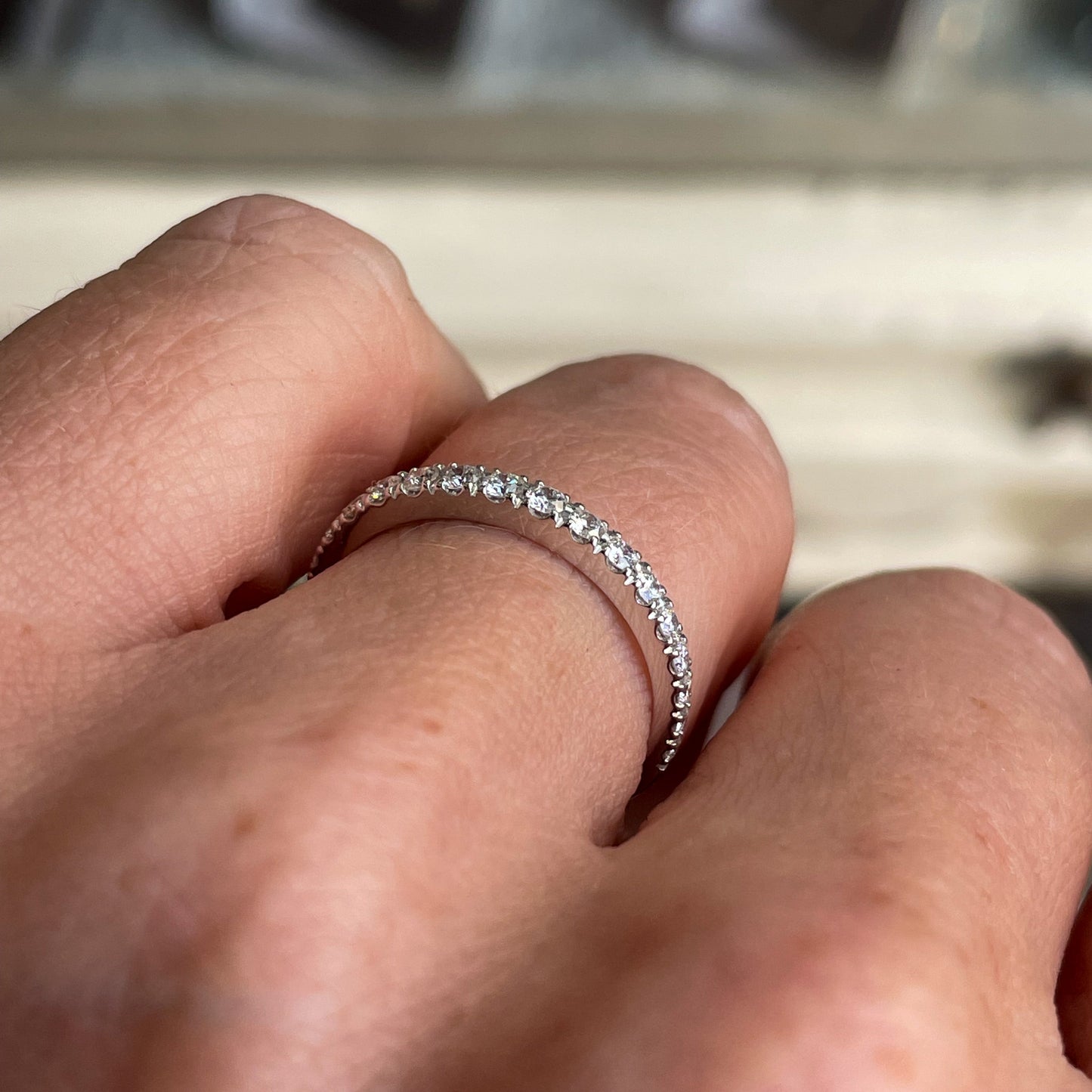 Mirco 18ct white gold diamond eternity ring with 0.36ct graduated diamonds, showcasing a sleek, elegant design.