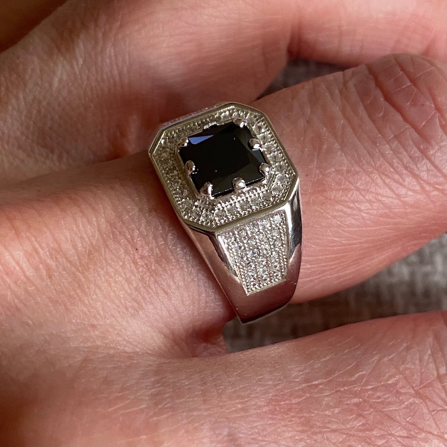 Silver black and white CZ ring by Insignia featuring a sleek band with sparkling cubic zirconia stones.