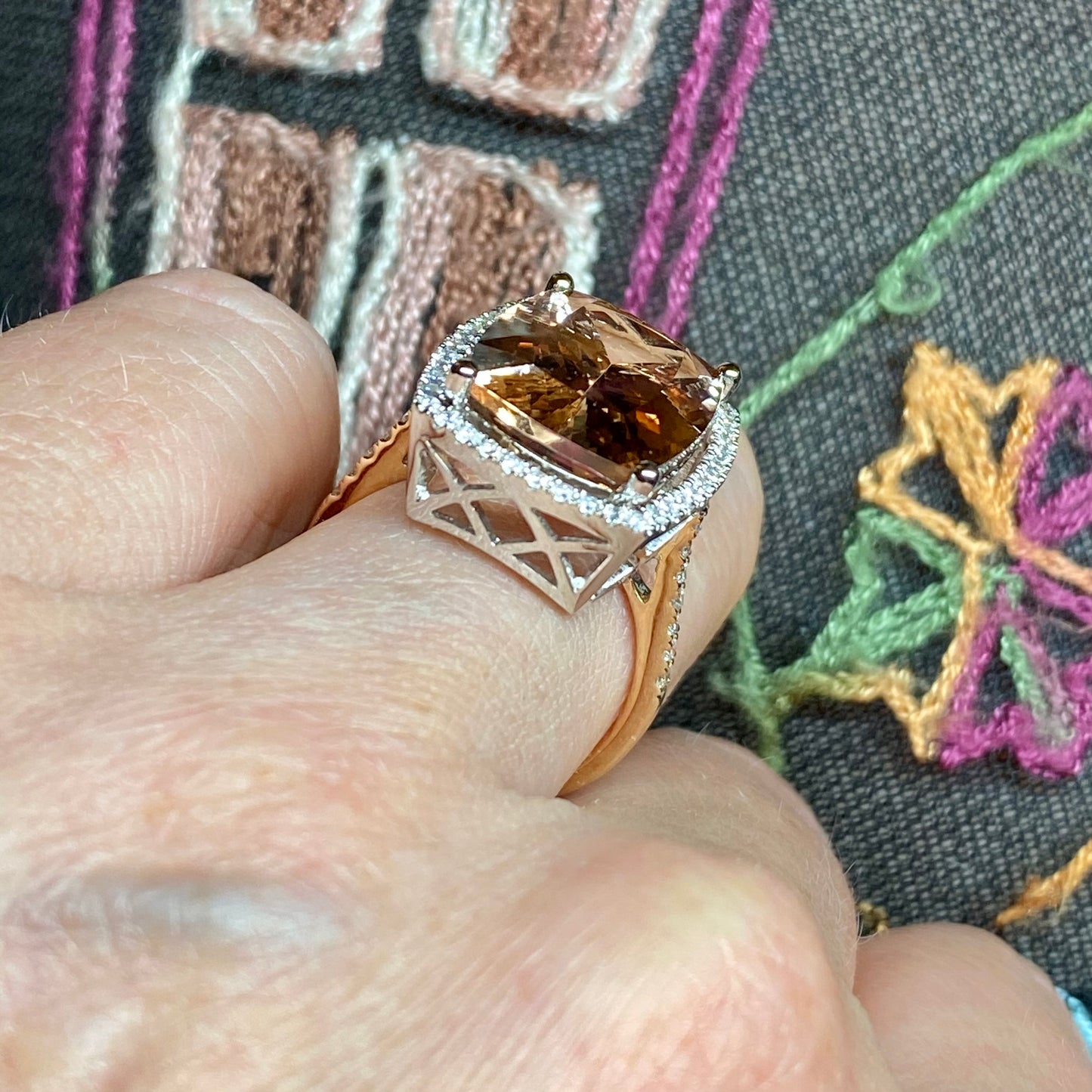 18ct rose gold Morganite and diamond ring with 9.54ct central stone, featuring intricate detailing and sparkling accents.