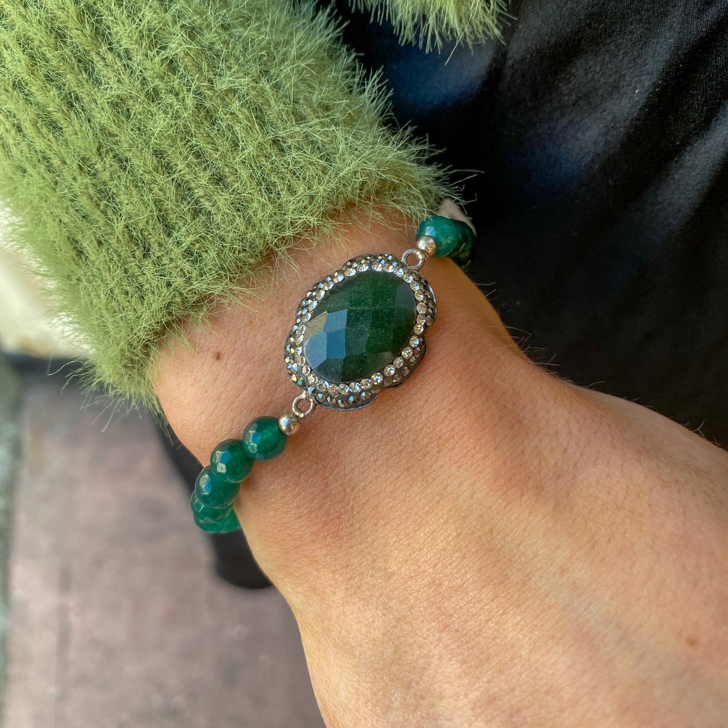 Silver stretch bracelet featuring marcasite and green stone accents by JOHN ROSS PRESYSTEM.