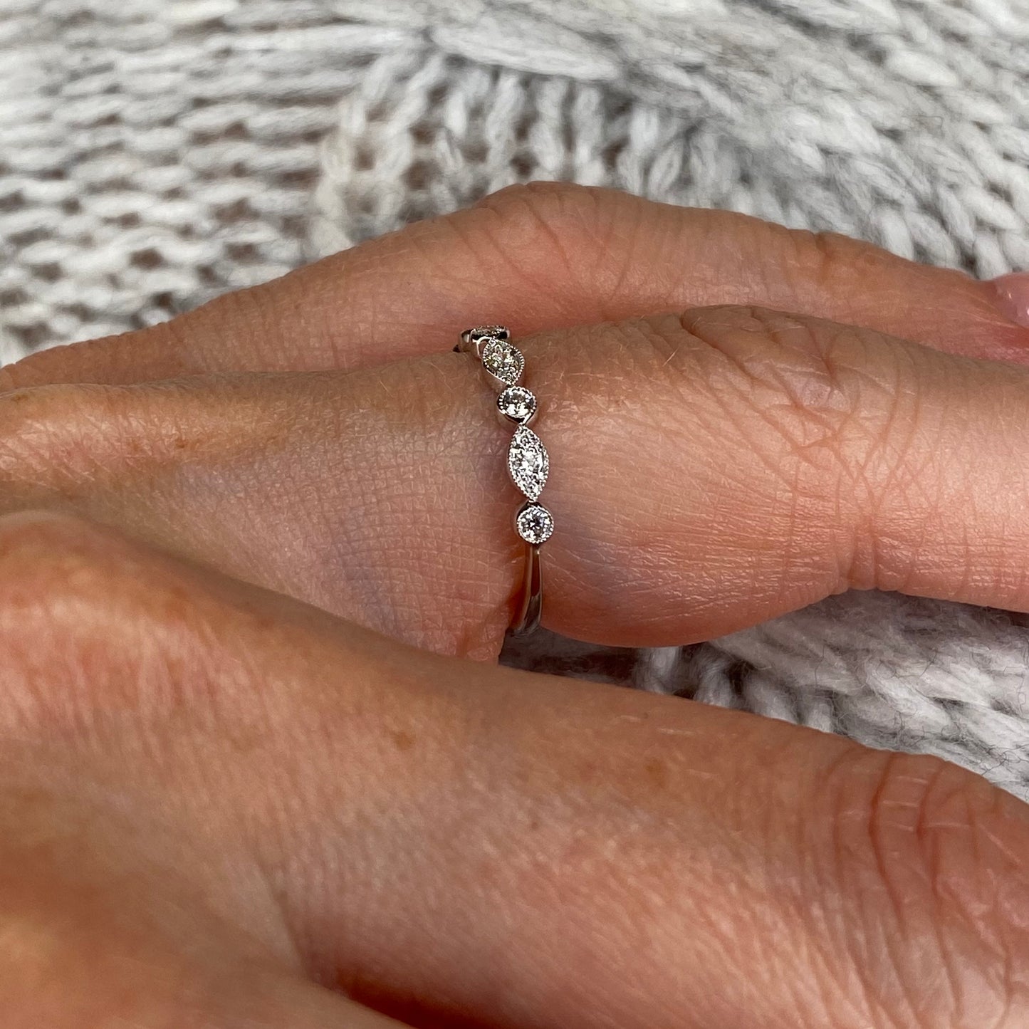 TCA 18ct white gold dainty diamond eternity ring with 0.22ct of sparkling diamonds, elegant wedding band design.