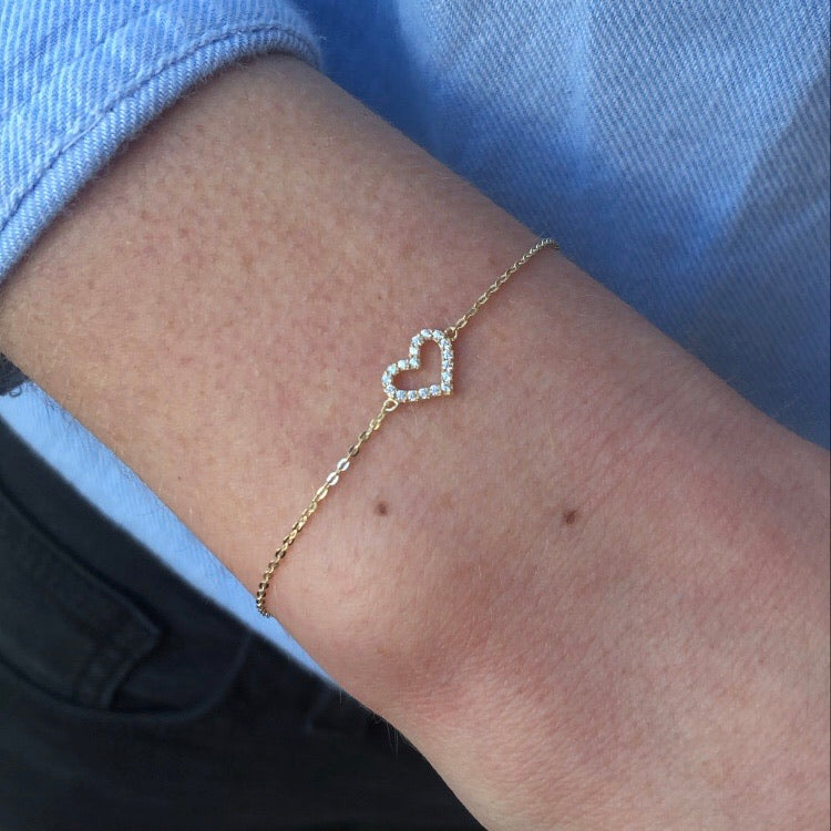 9ct gold CZ open heart bracelet by THC featuring a delicate chain with a heart-shaped CZ pendant.