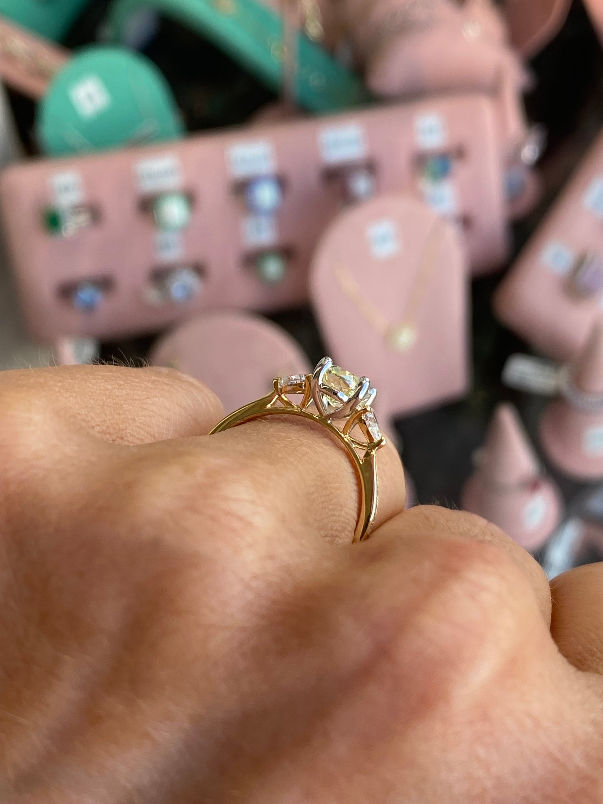 18ct gold yellow oval solitaire engagement ring with 1.50ct certified lab diamond, showcasing elegant design and yellow gold finish.