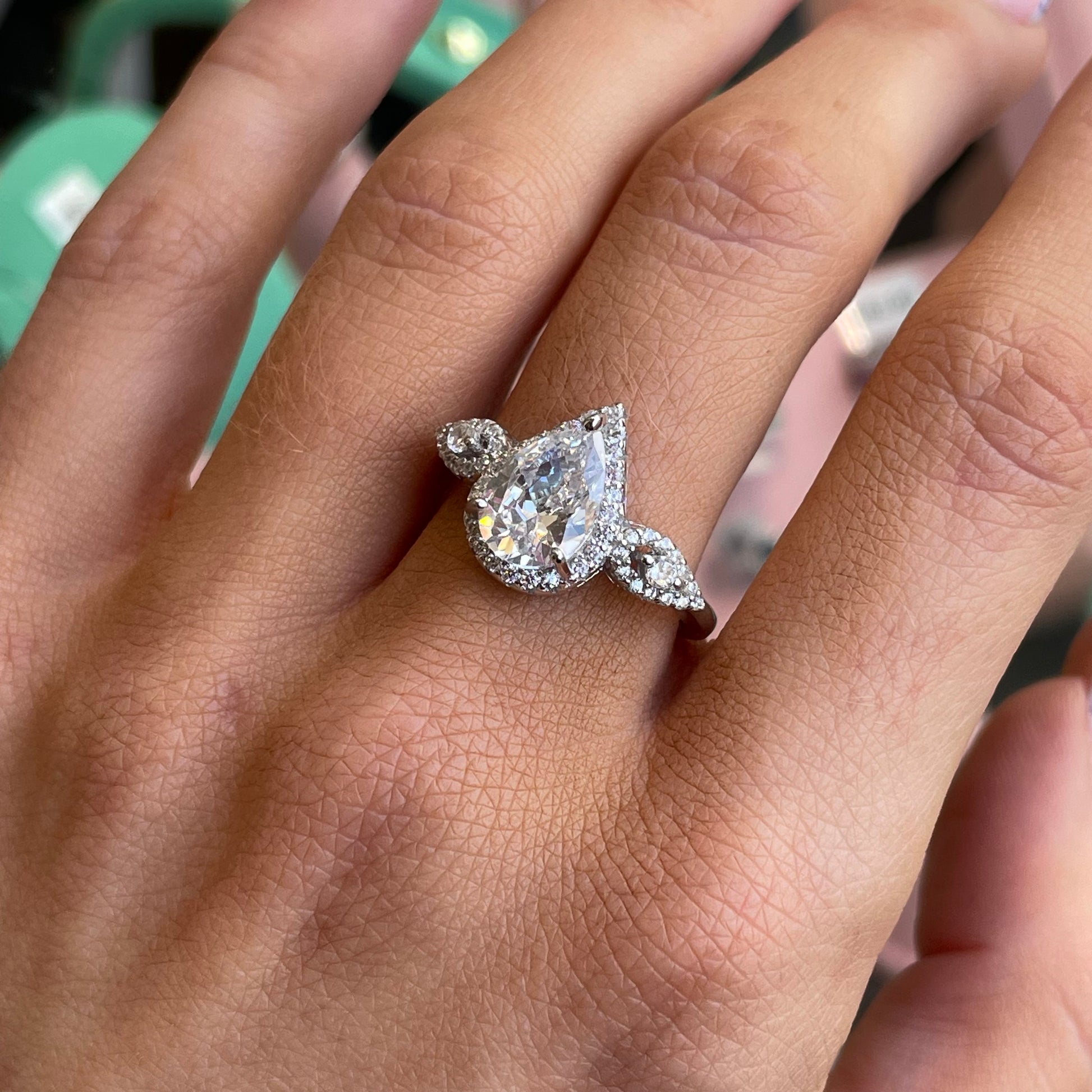 Silver Emilie ring by Comero featuring a sleek, polished band with elegant design, displayed on a neutral background.