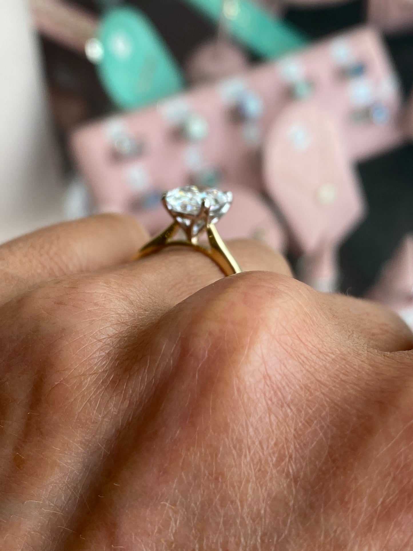 18ct gold oval solitaire engagement ring with a 3.02ct certified diamond by Prima, featuring a classic and elegant design.