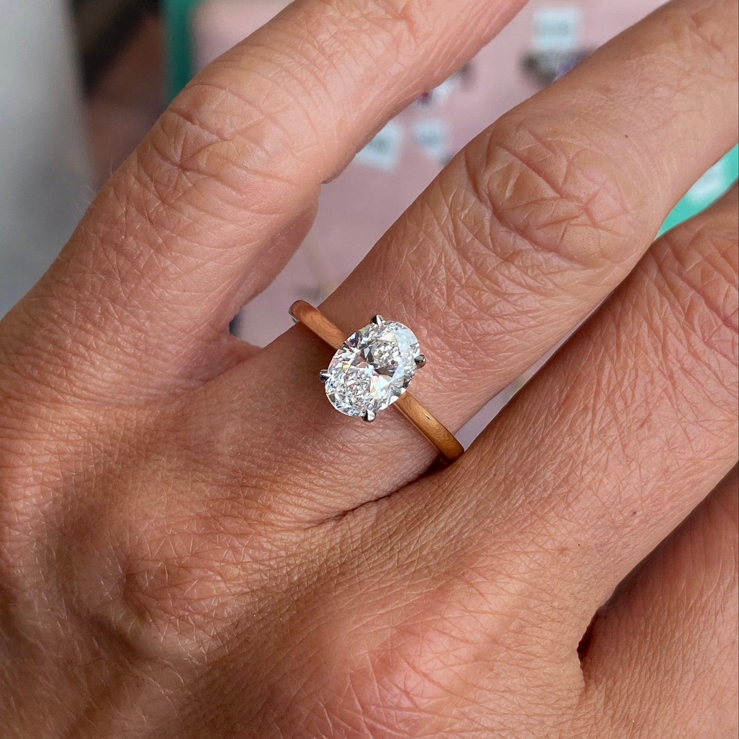 18ct gold oval solitaire engagement ring by Domino featuring a 1.51ct certificated lab-grown diamond.