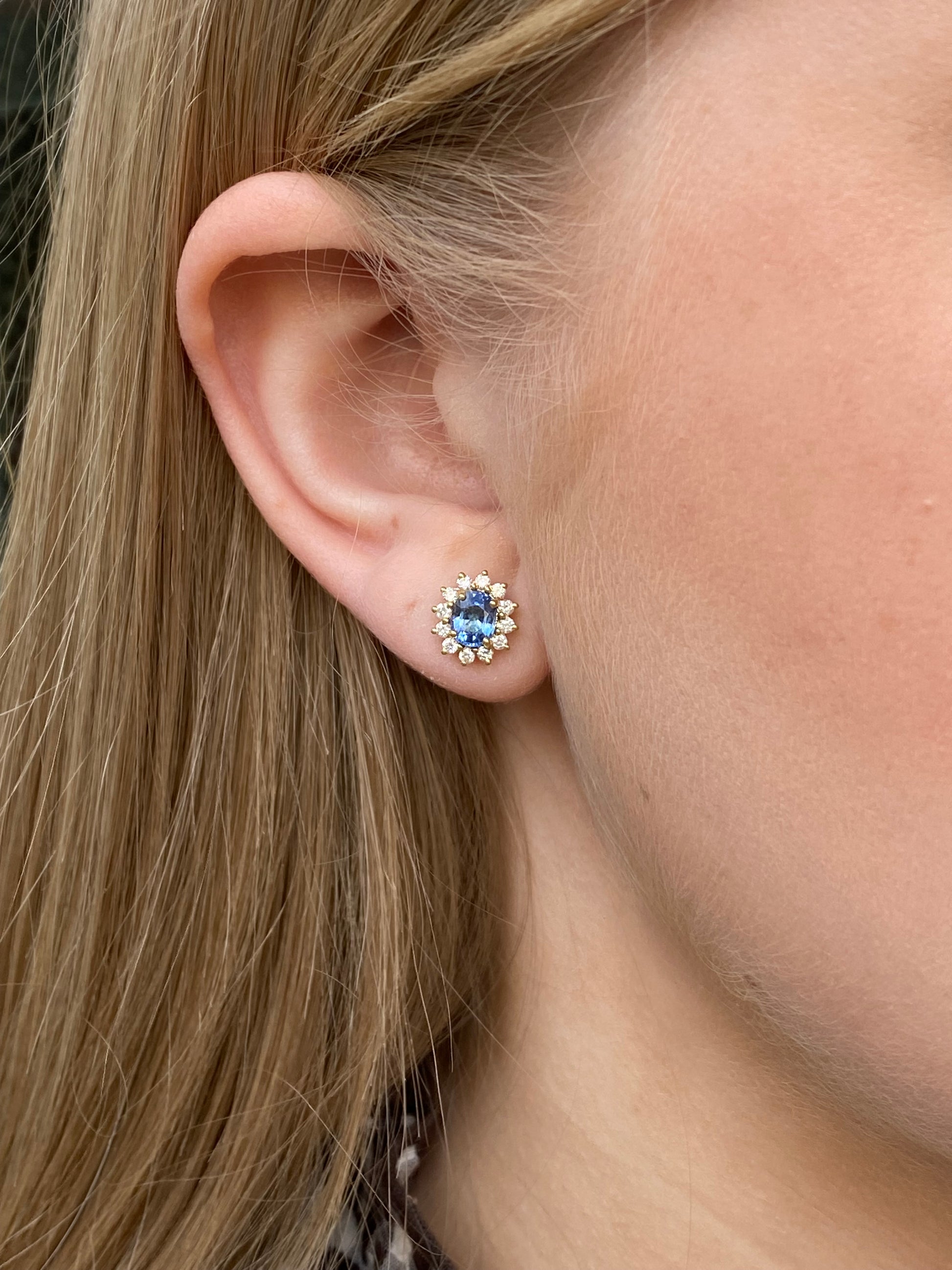18ct gold sapphire and diamond oval cluster stud earrings by LMJ, featuring sparkling blue sapphires and white diamonds.