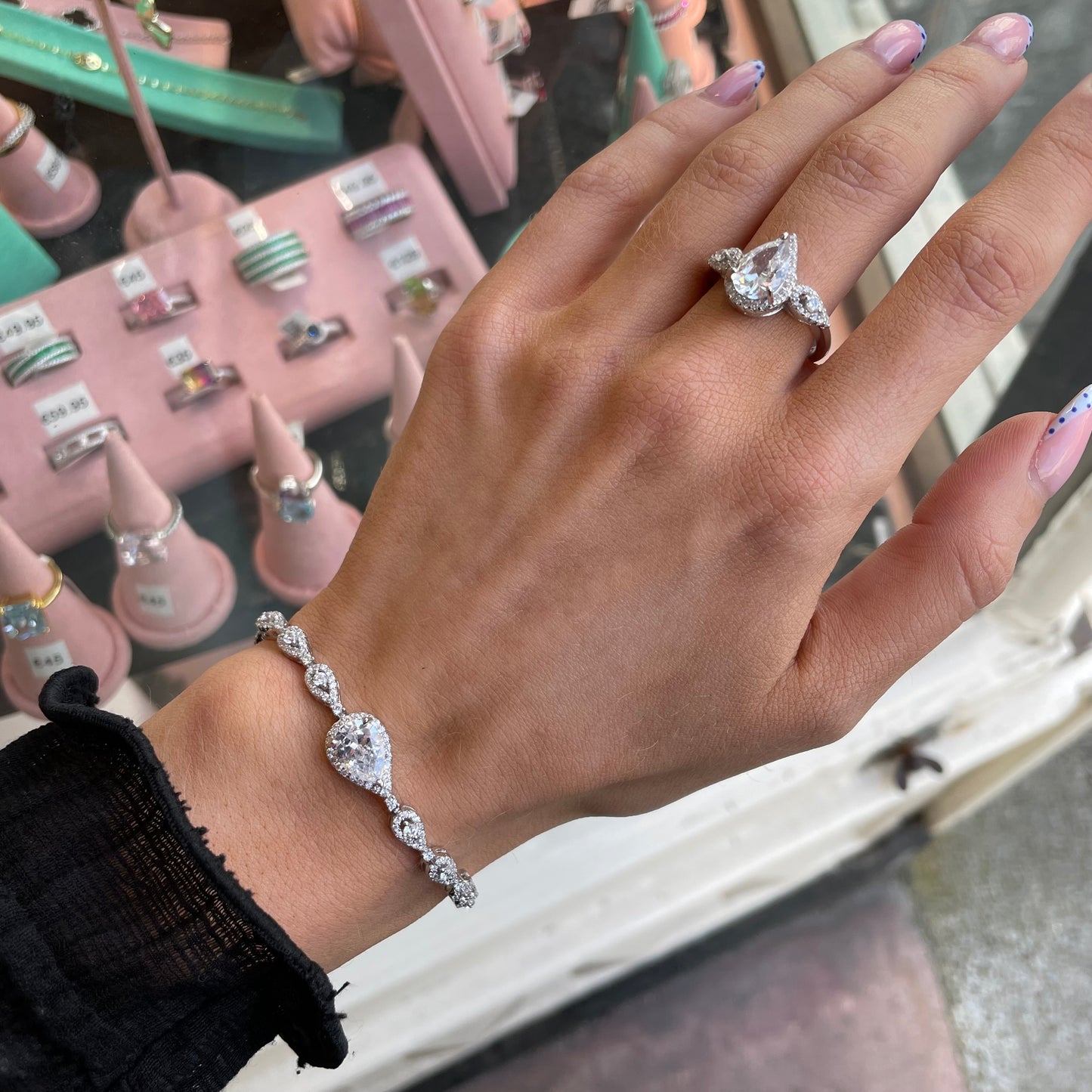 Silver Emilie ring by Comero featuring a sleek, polished band with a minimalist design.