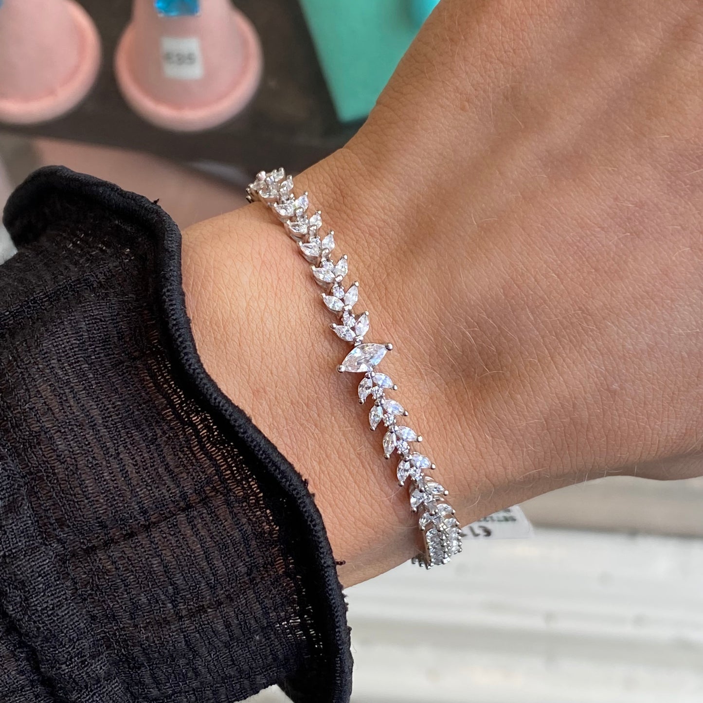Silver Katelyn Bracelet by Comero showing a sleek, polished silver bracelet with elegant design details.