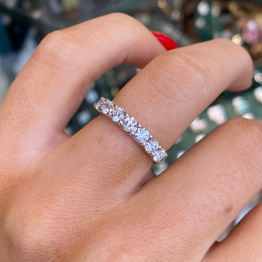 18ct gold diamond eternity ring by FEU featuring a continuous row of sparkling 1.02ct diamonds on a sleek gold band