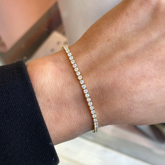 Sunshine CZ tennis bracelet by Comero featuring 2mm sparkling cubic zirconia stones on a delicate silver chain