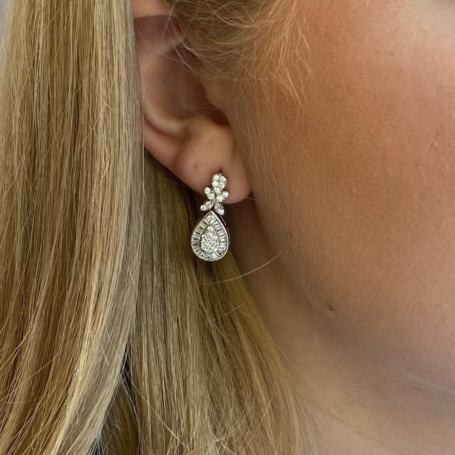 Silver Juno Drop Earrings by Comero featuring sleek, elegant drop design with a polished finish.