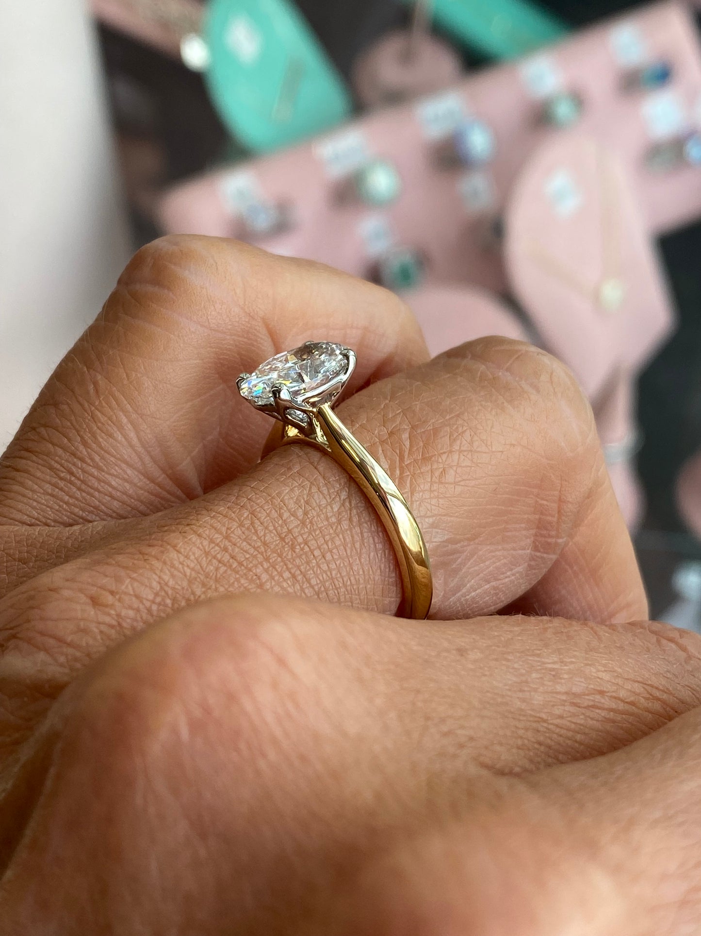 Prima 18ct gold oval solitaire engagement ring with a 2.30ct certified diamond, showcasing a classic and elegant design.