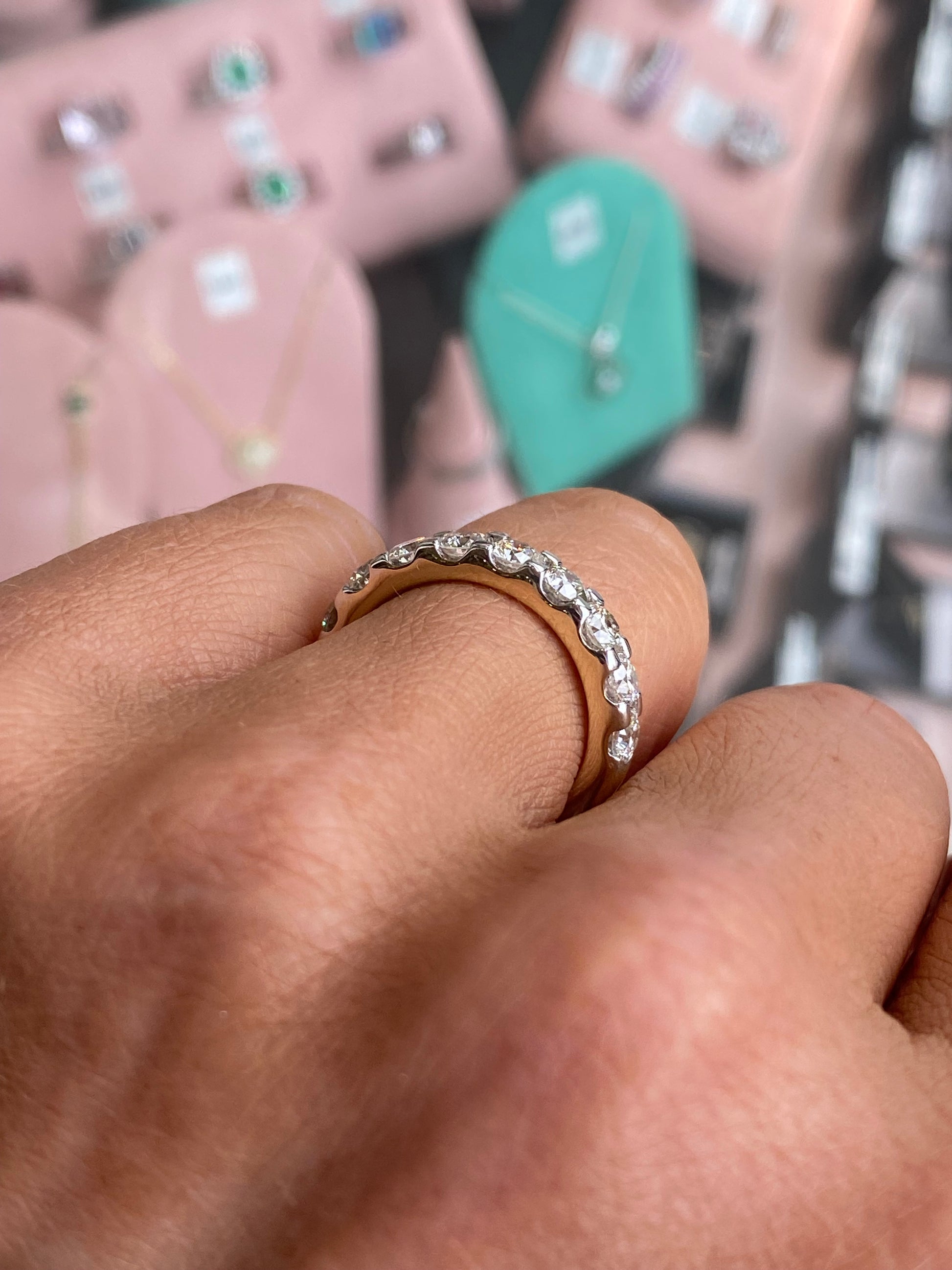14ct gold diamond eternity ring by UJT with 1.65ct of sparkling diamonds, showcasing a continuous circle of brilliance.