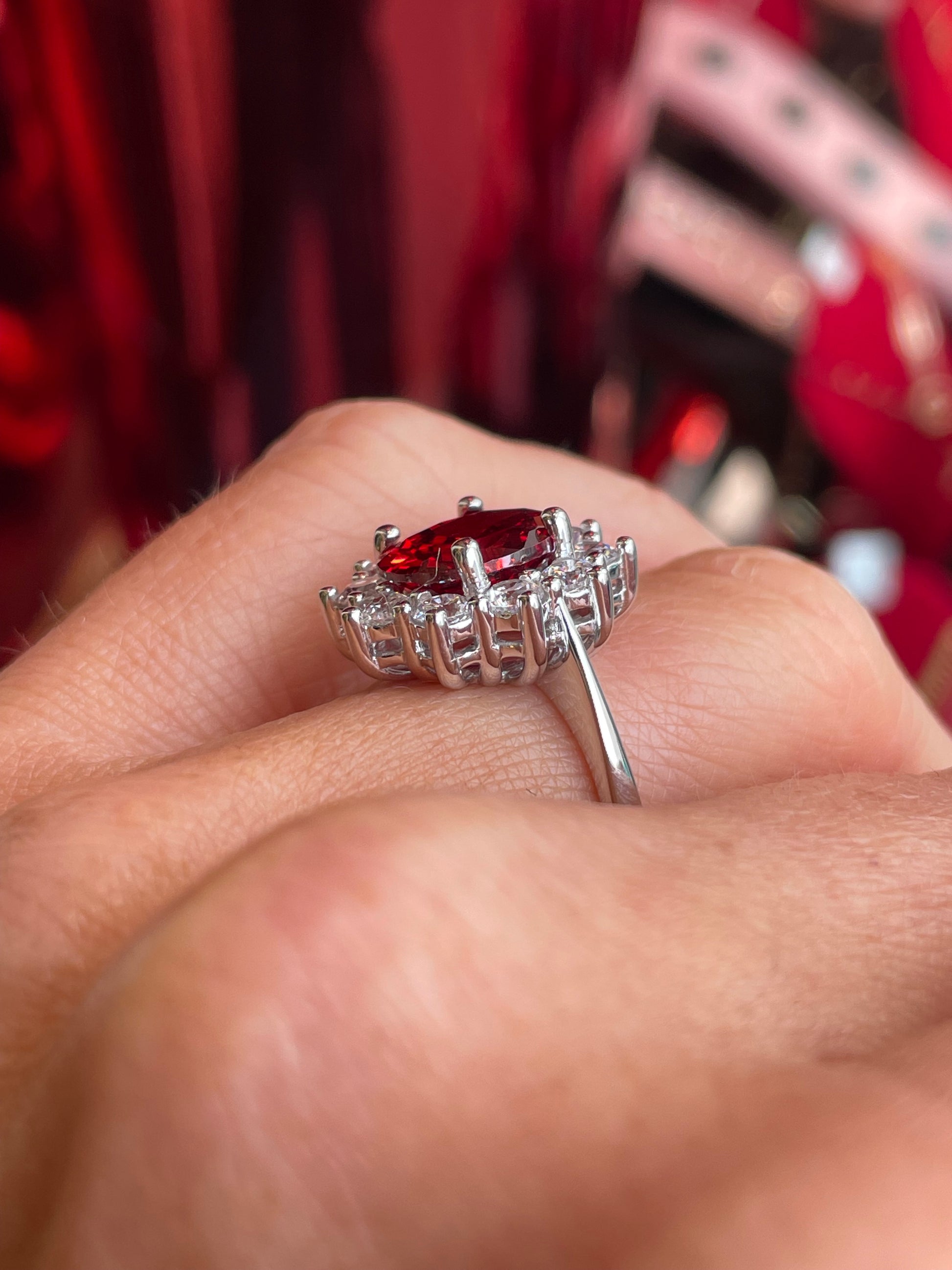 Silver Garnet Red Oval Statement Ring by Comero featuring a bold red oval garnet gemstone set in silver.
