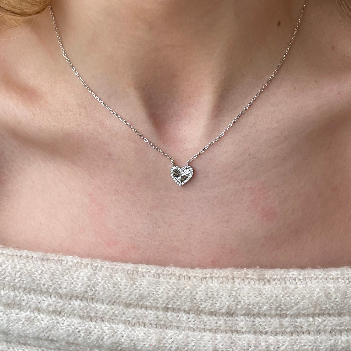 Silver CZ heart necklace by Comero with 40+5cm chain, featuring a sparkling heart pendant on a sleek silver chain.