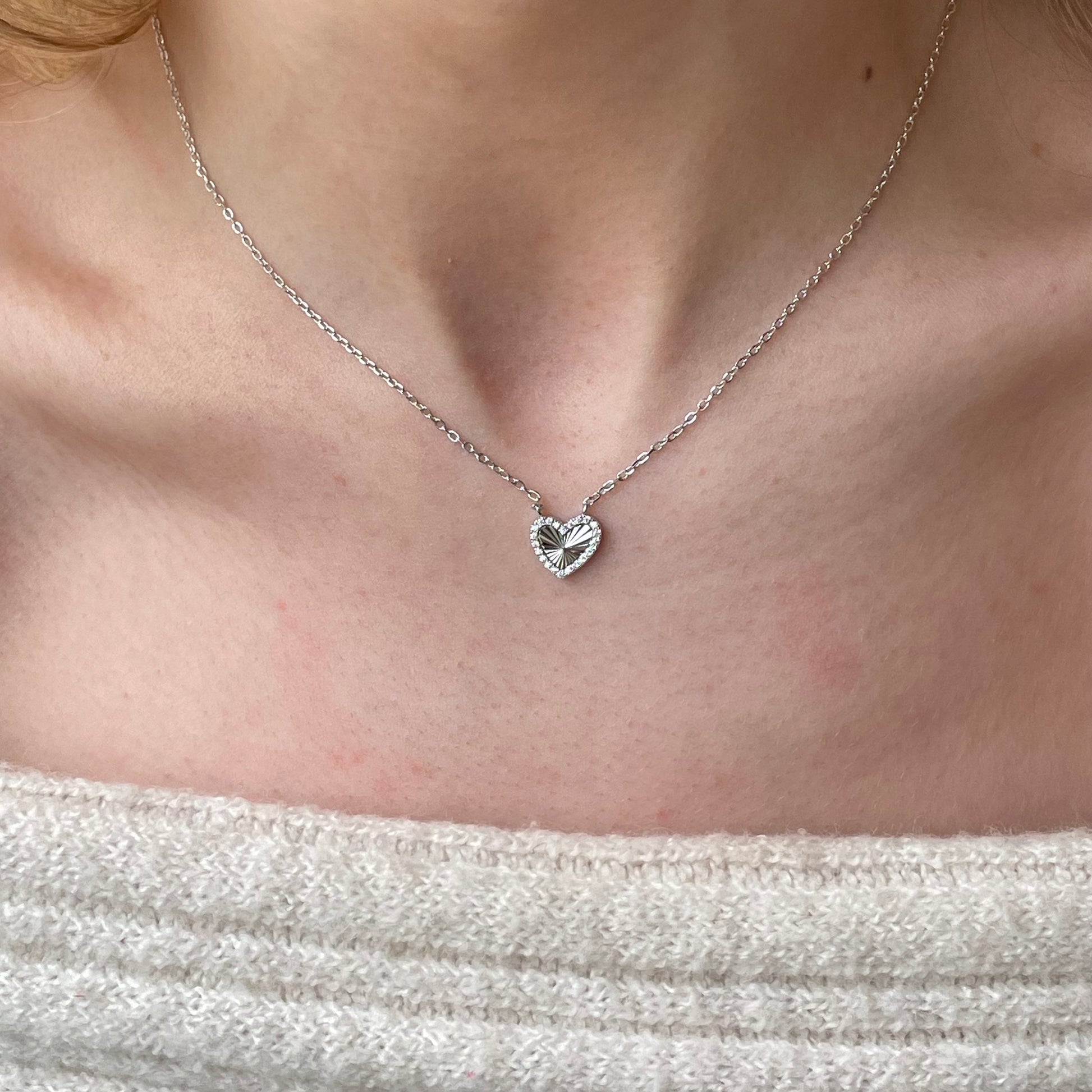 Silver CZ heart necklace by Comero with 40+5cm chain, featuring a sparkling heart pendant on a sleek silver chain.