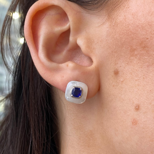 Silver sapphire blue mother of pearl stud earrings by Comero featuring elegant, round pearl designs on classic earrings.