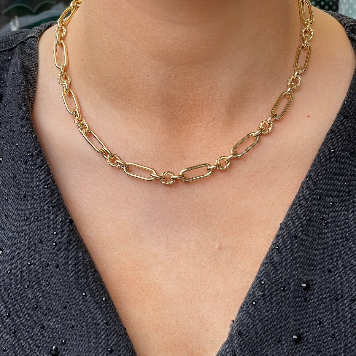 9ct gold long twist link necklace by Mark Milton, featuring elegant interlocking chain links on a white background.