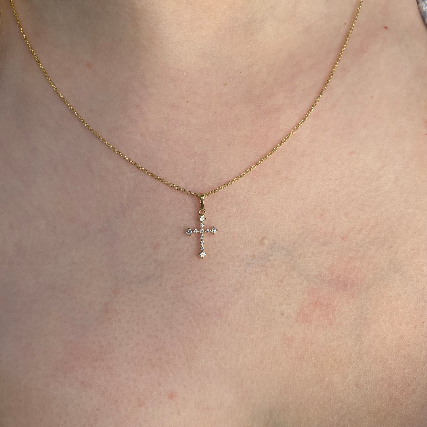 Small 9ct gold CZ Orthodox cross pendant necklace by THC, featuring intricate design and a polished finish.