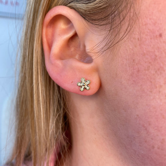 Insignia Sunshine CZ flower stud earrings featuring sparkling cubic zirconia blossoms on silver-tone metal.