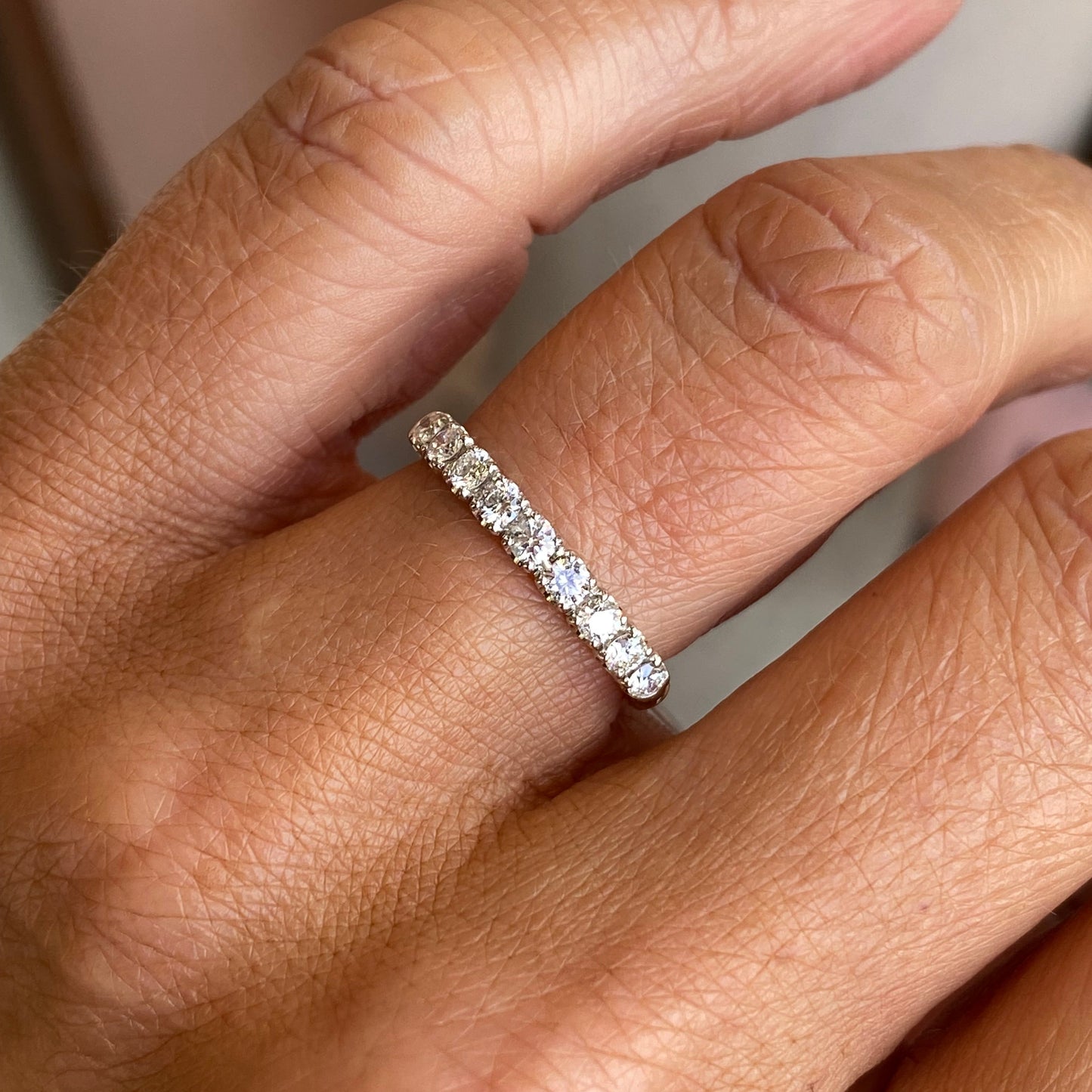 Lanza 18ct gold nine-stone diamond wedding or eternity ring with 0.45ct total diamond weight, showcasing the detailed design.