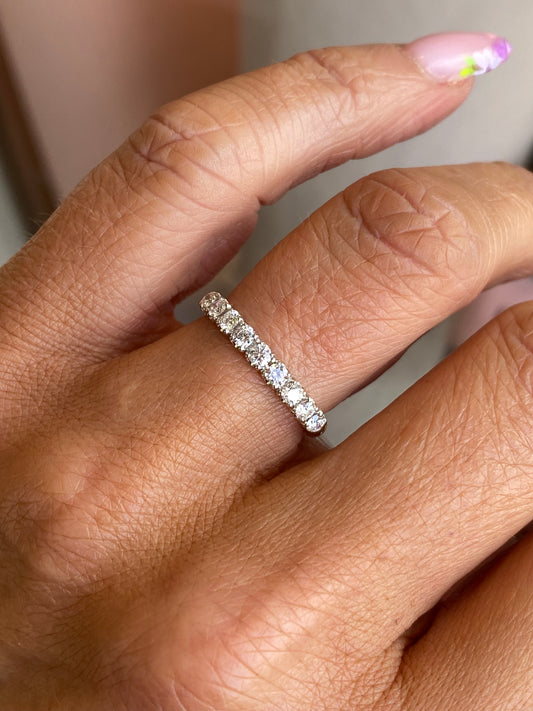 Lanza 18ct gold nine-stone diamond wedding or eternity ring with 0.45ct total diamond weight, showcasing the detailed design.