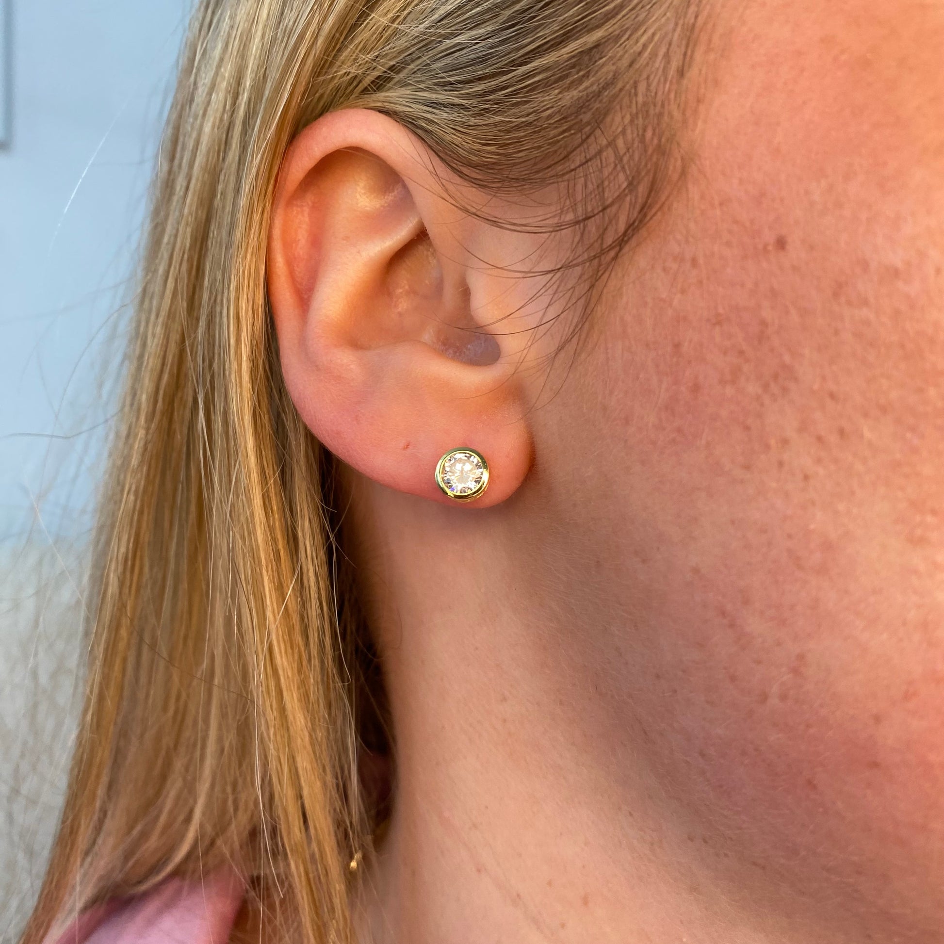 Sunshine CZ earring and necklace set by Insignia featuring round design with sparkling cubic zirconia stones.
