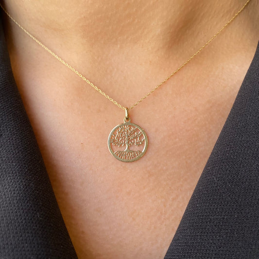 9ct gold Tree of Life necklace with detailed pendant, showcasing intricate design on a delicate chain.