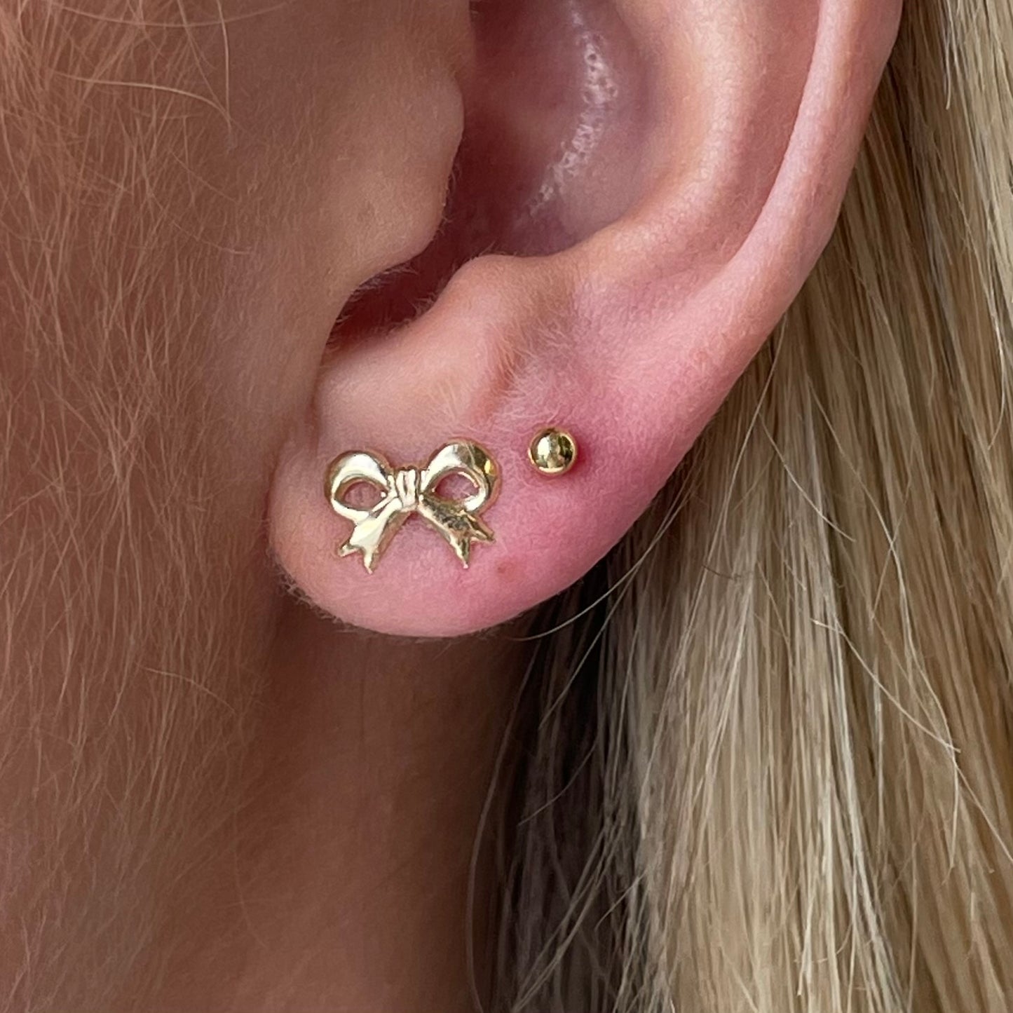 9ct gold pretty bow stud earrings by THC featuring delicate bow design and secure post back for elegant everyday wear